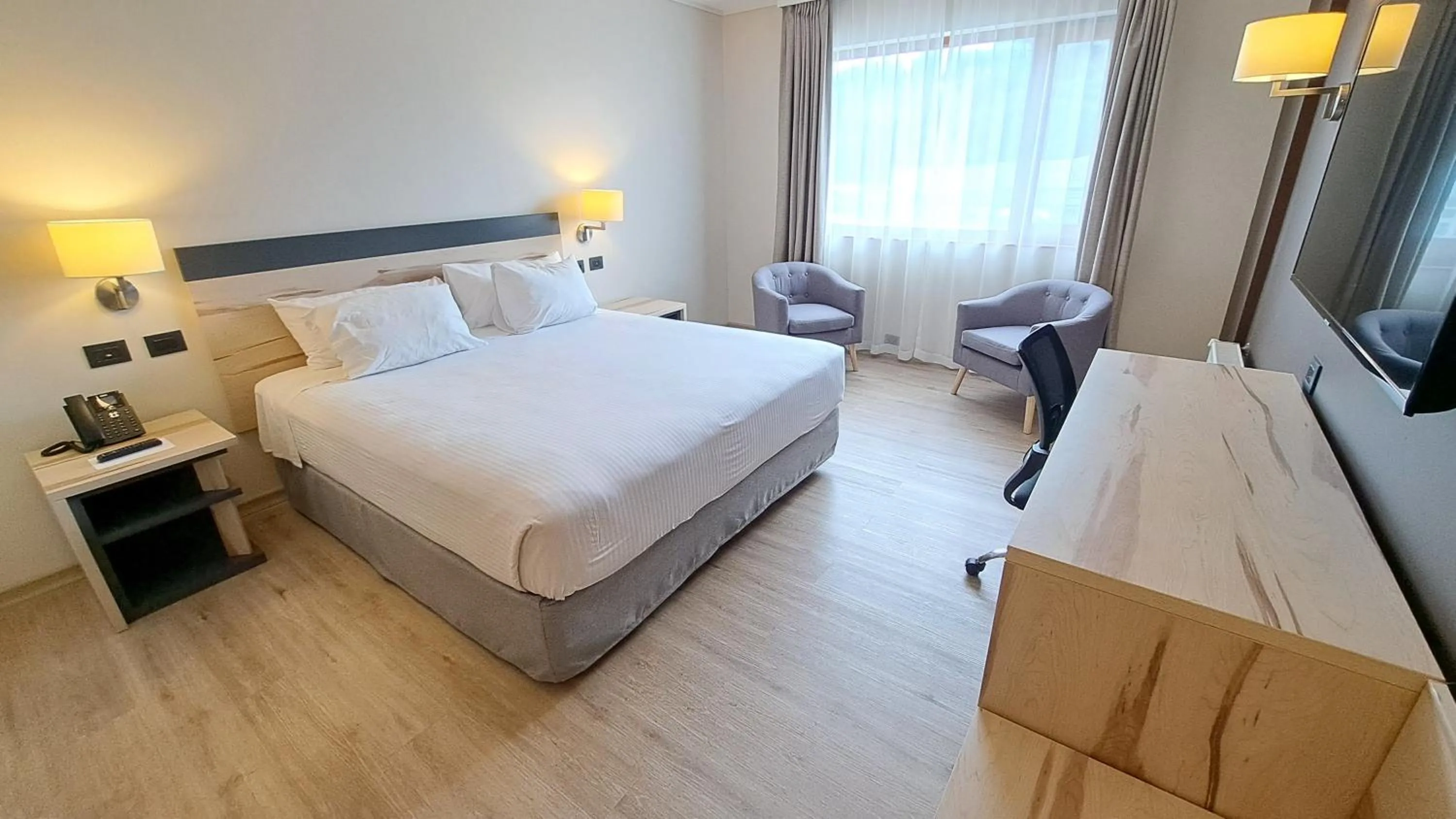 Bed in Hotel Diego de Almagro Castro