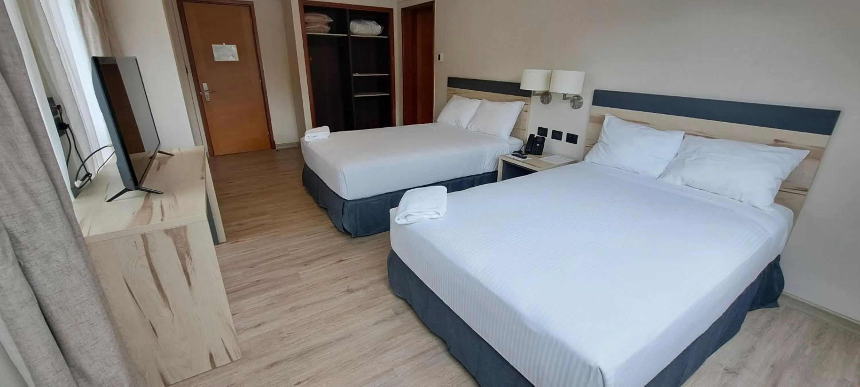 Bed in Hotel Diego de Almagro Castro