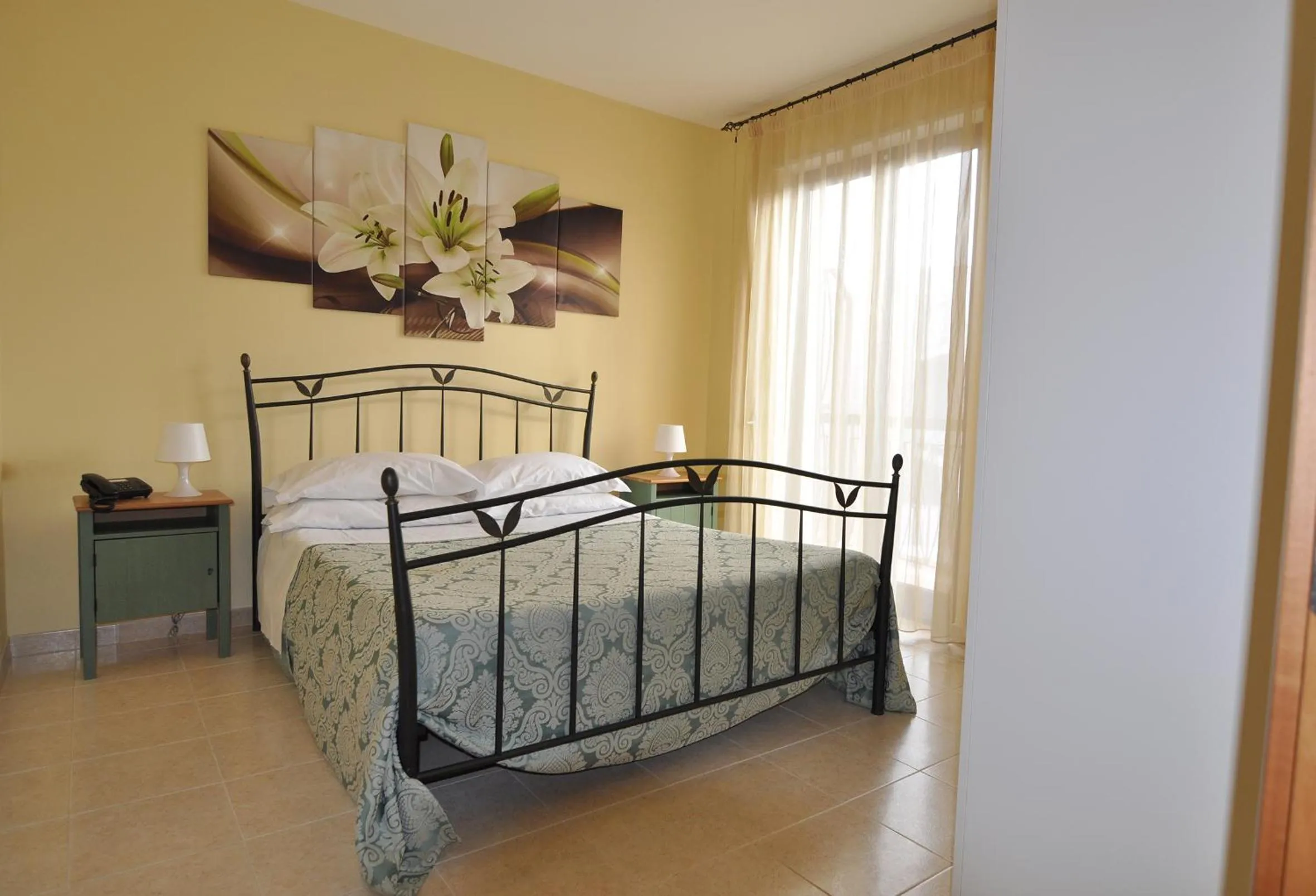 Bed in Ciao Hotel & Residence - Apartments