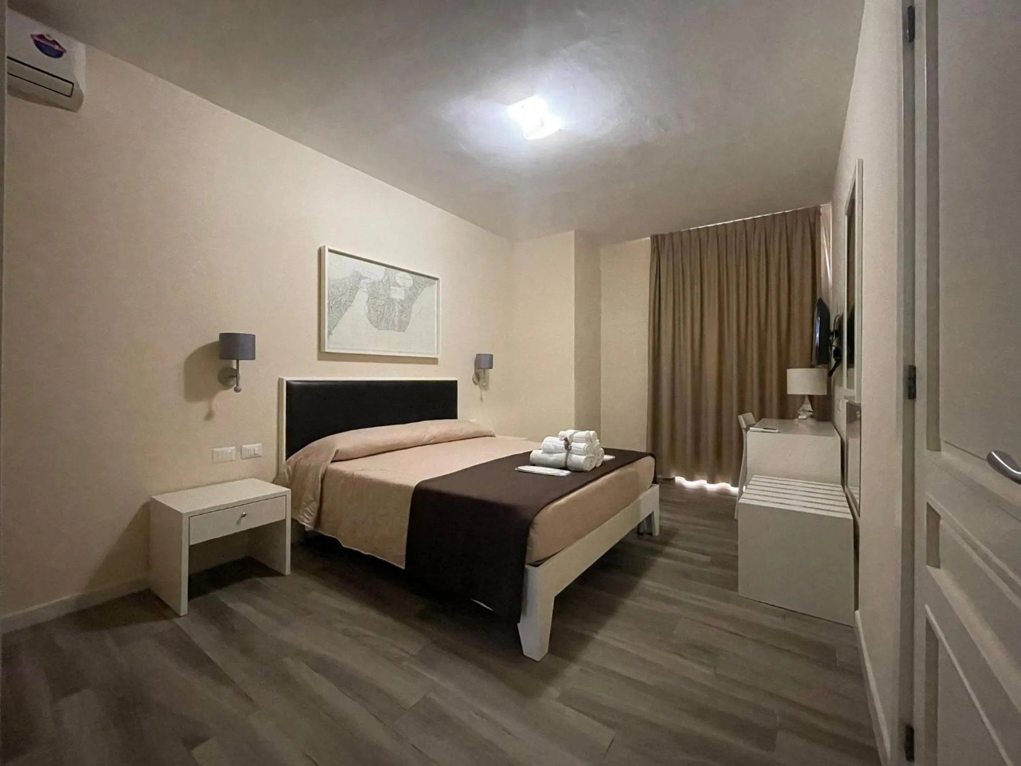 Bed in Faro Bianco Gallipoli Dependance