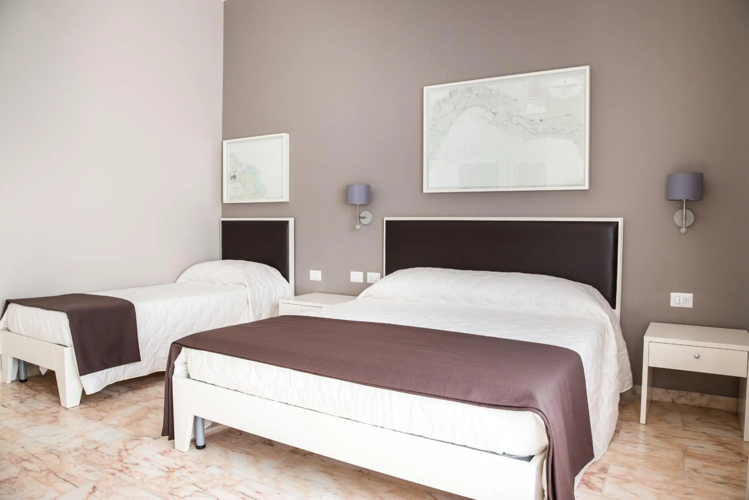 Bed in Faro Bianco Gallipoli Dependance