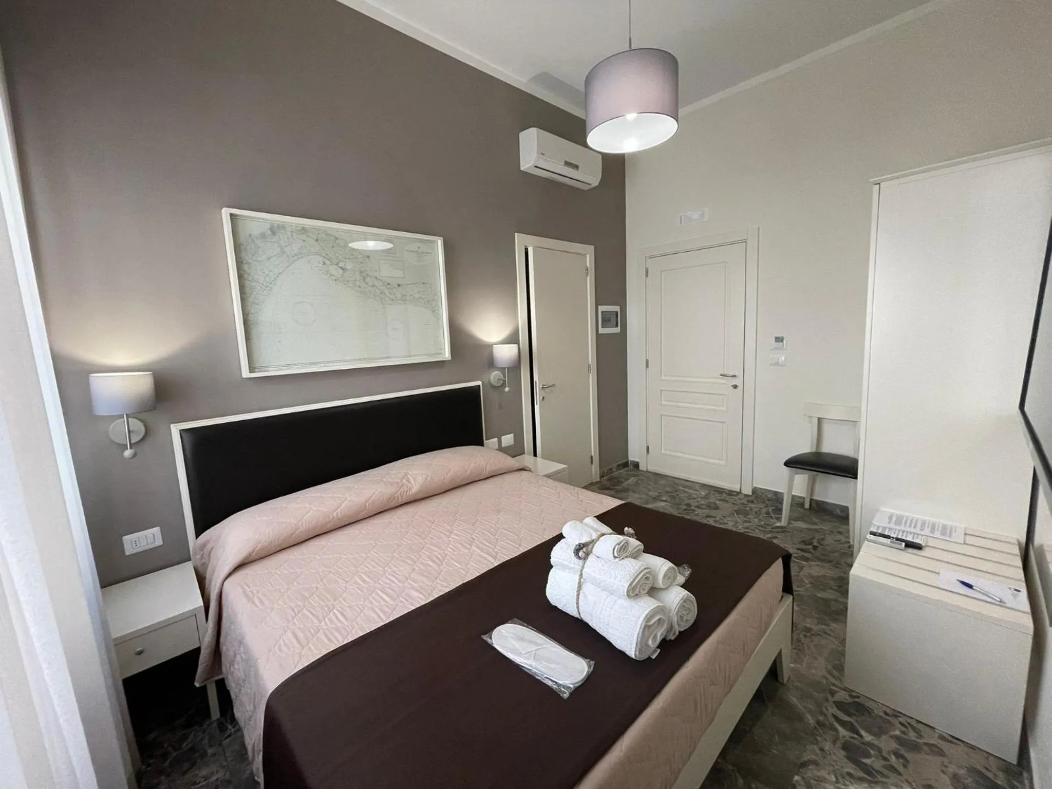 Bed in Faro Bianco Gallipoli Dependance