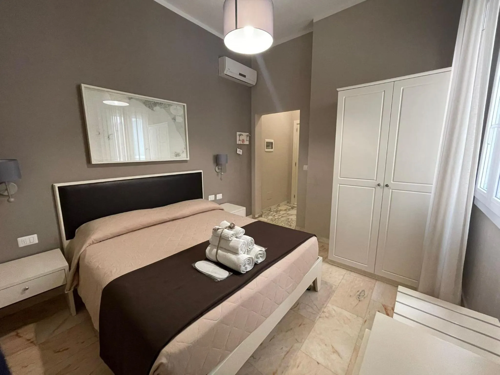 Bed in Faro Bianco Gallipoli Dependance