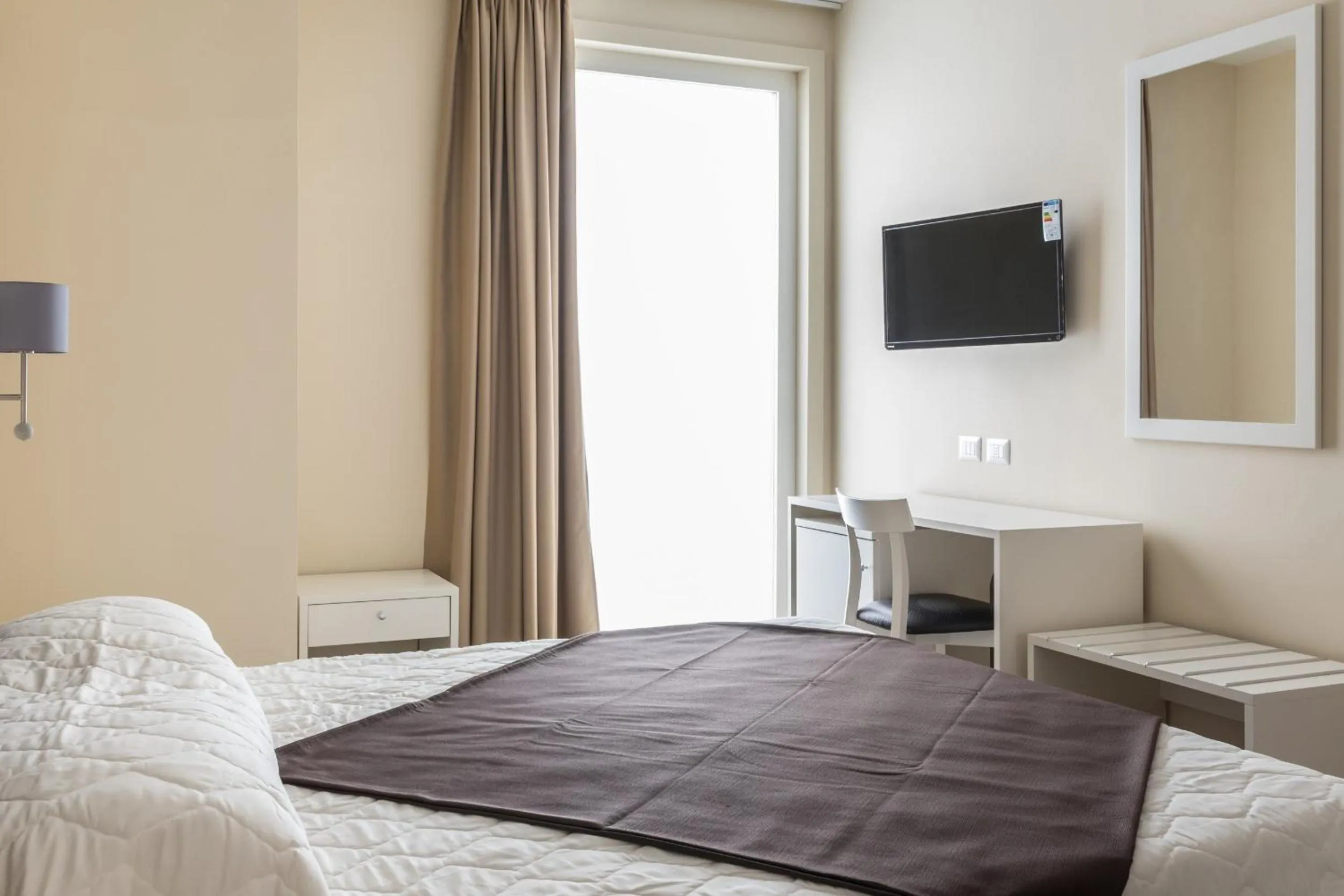 Photo of the whole room, Bed in Faro Bianco Gallipoli Dependance