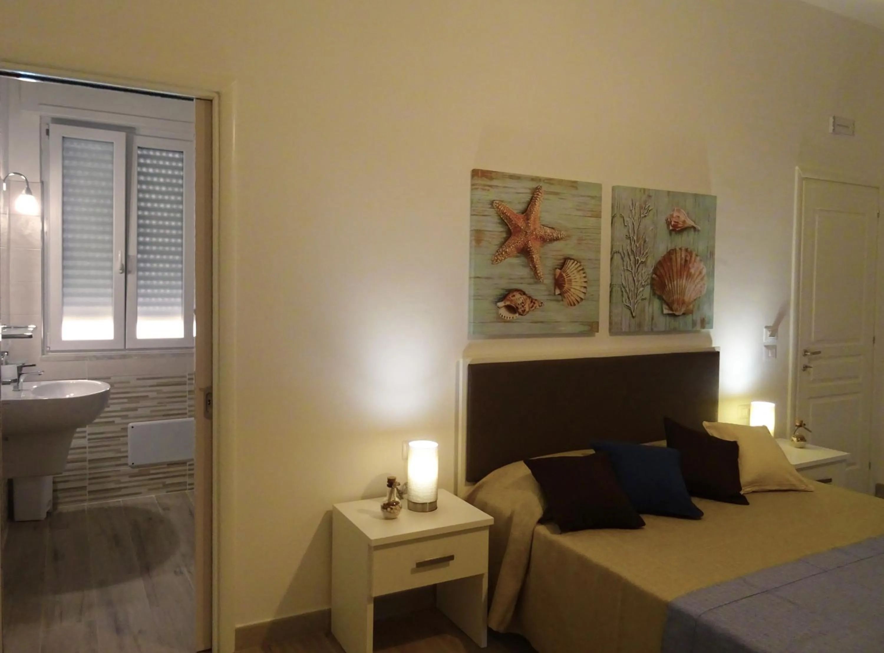 Bed in Faro Bianco Gallipoli Dependance