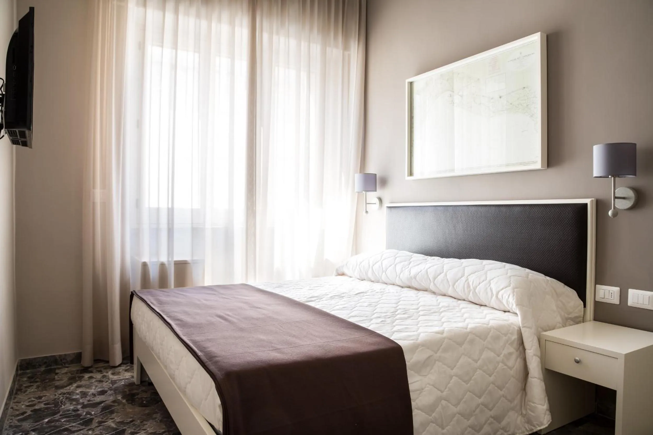 Bed in Faro Bianco Gallipoli Dependance