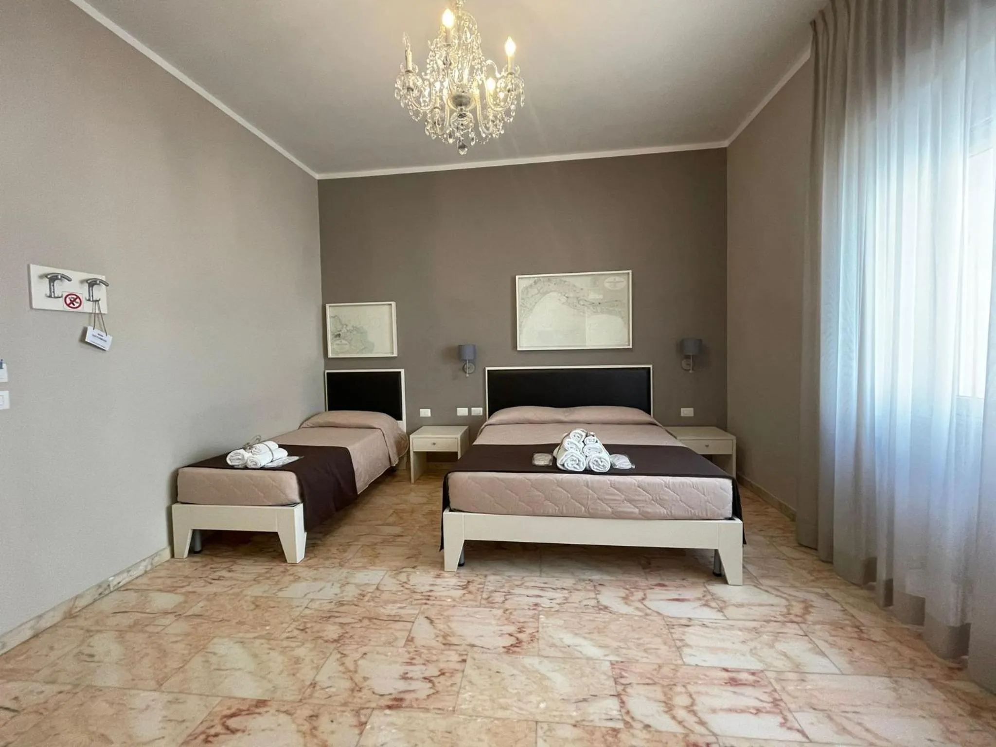 Bed in Faro Bianco Gallipoli Dependance