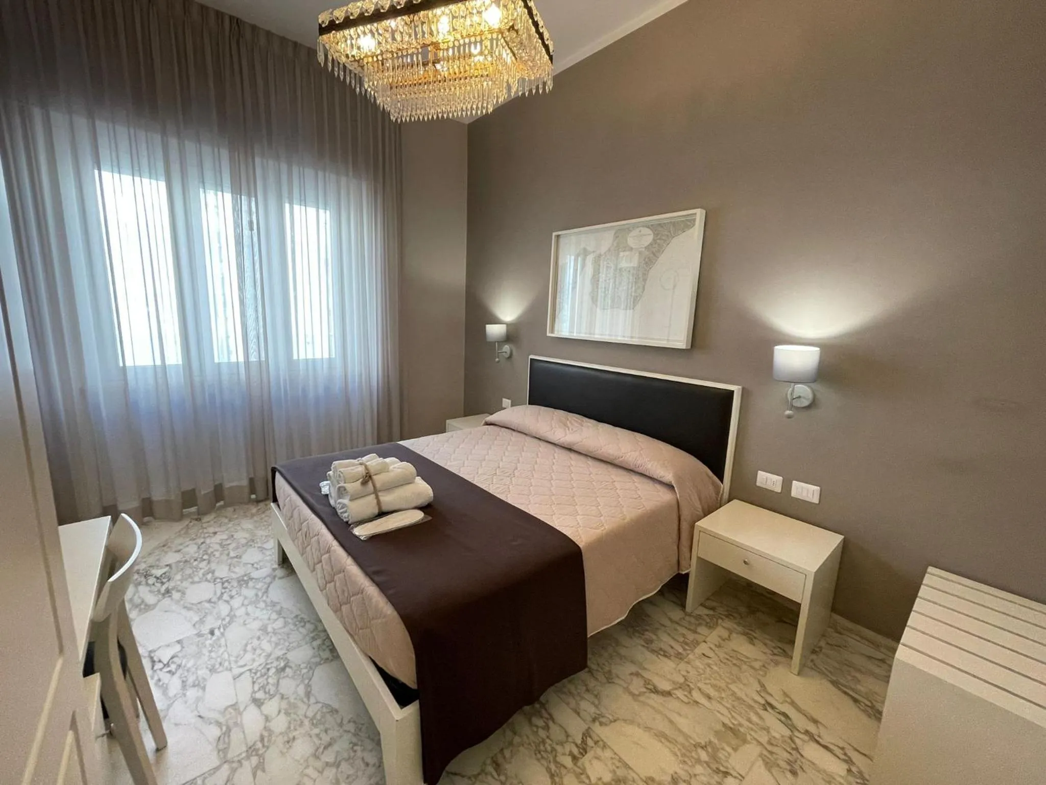 Bed in Faro Bianco Gallipoli Dependance