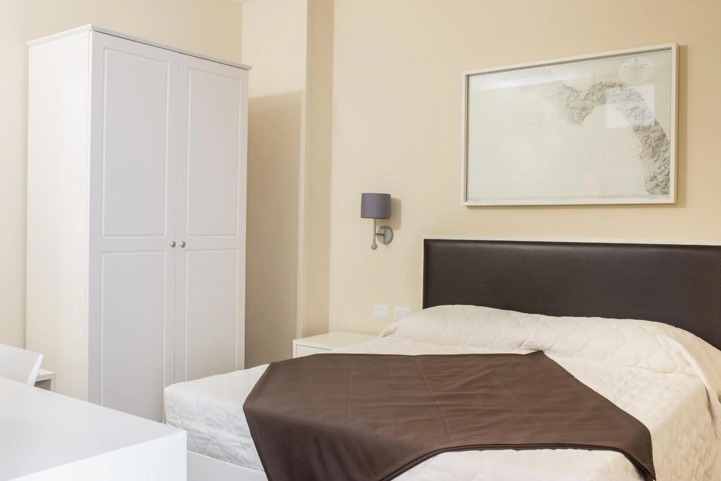 Bed in Faro Bianco Gallipoli Dependance