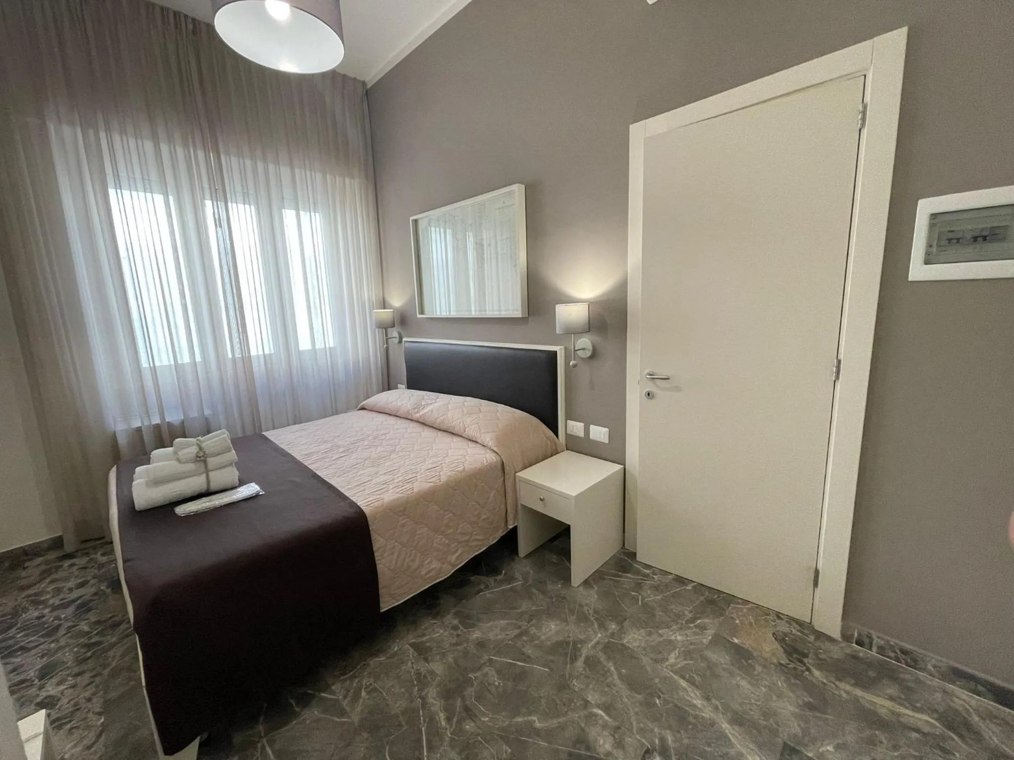 Bed in Faro Bianco Gallipoli Dependance