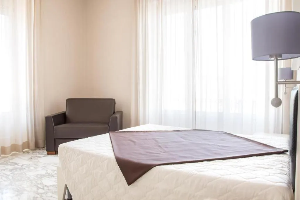 Bed in Faro Bianco Gallipoli Dependance