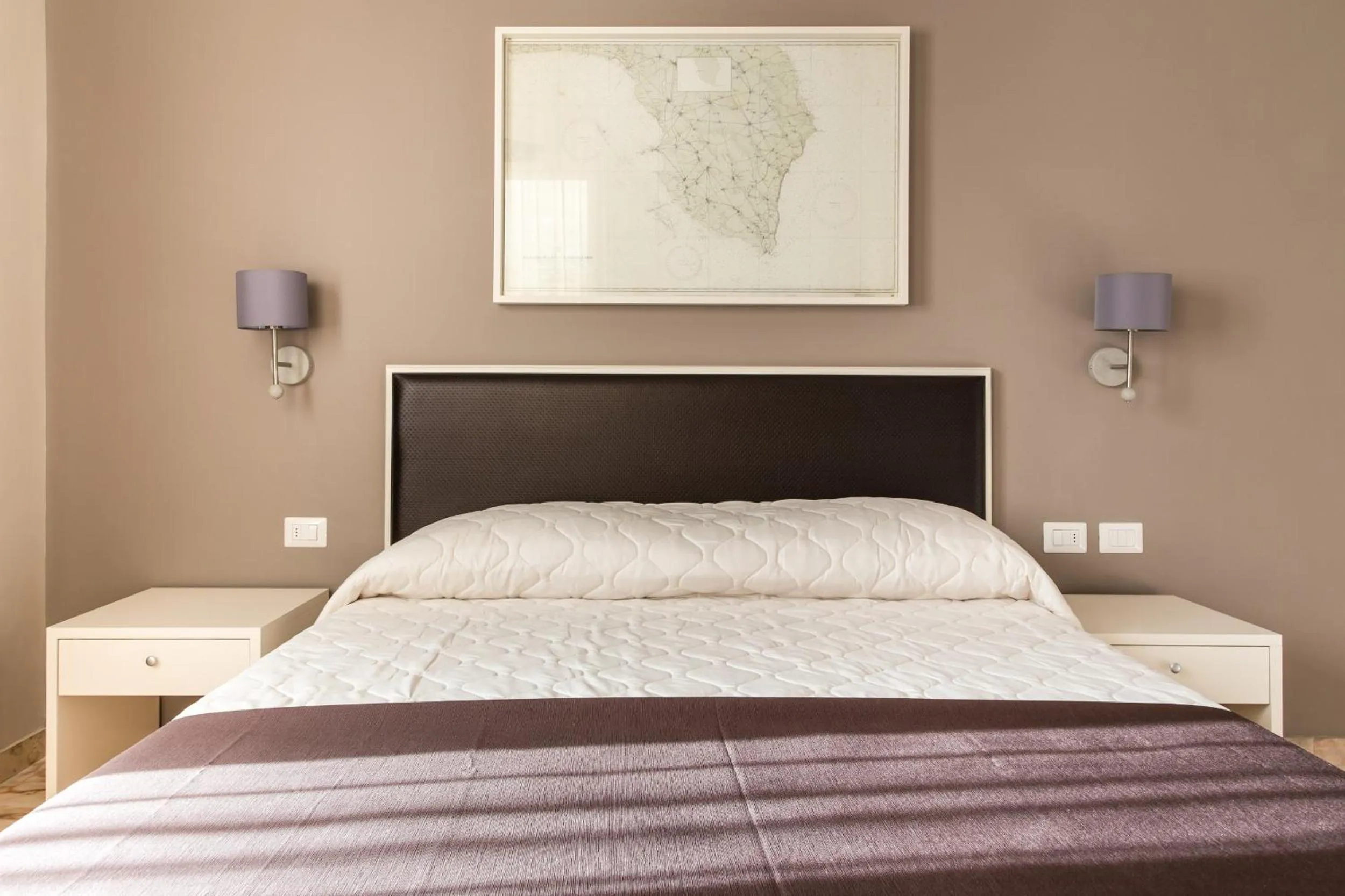 Bed in Faro Bianco Gallipoli Dependance