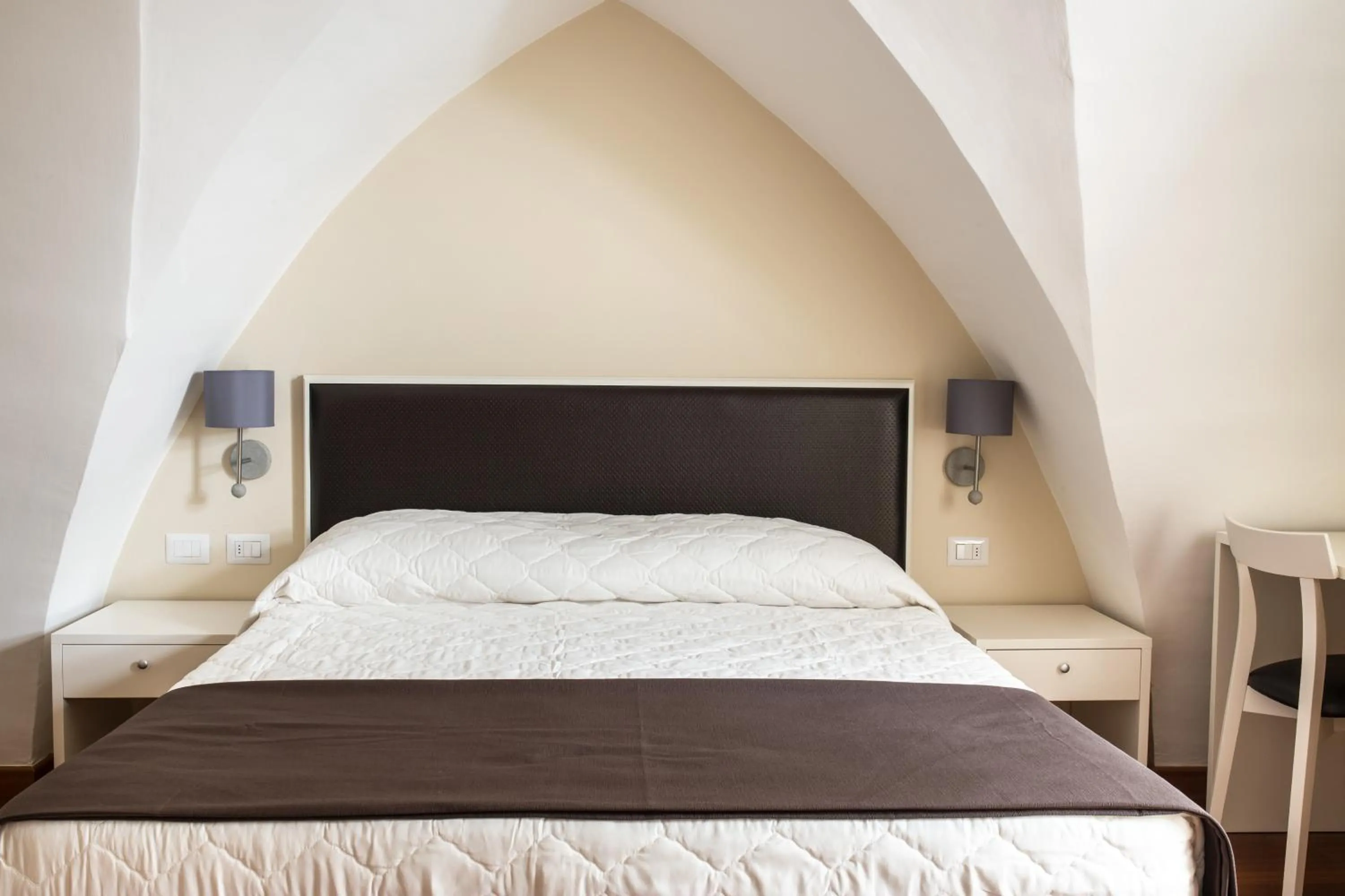 Bed in Faro Bianco Gallipoli Dependance