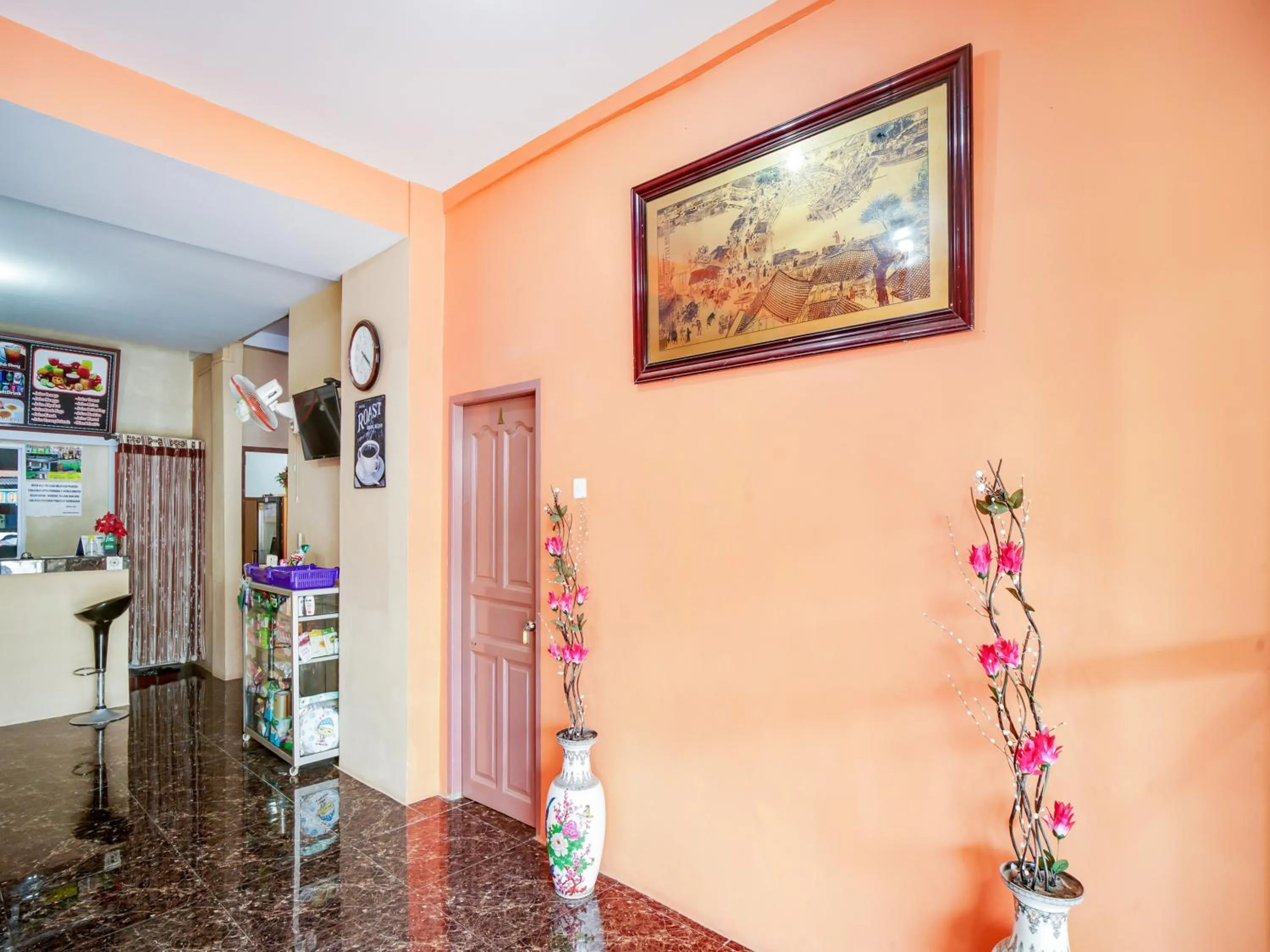 Lobby or reception in OYO 90024 Botania Homestay and Cafe