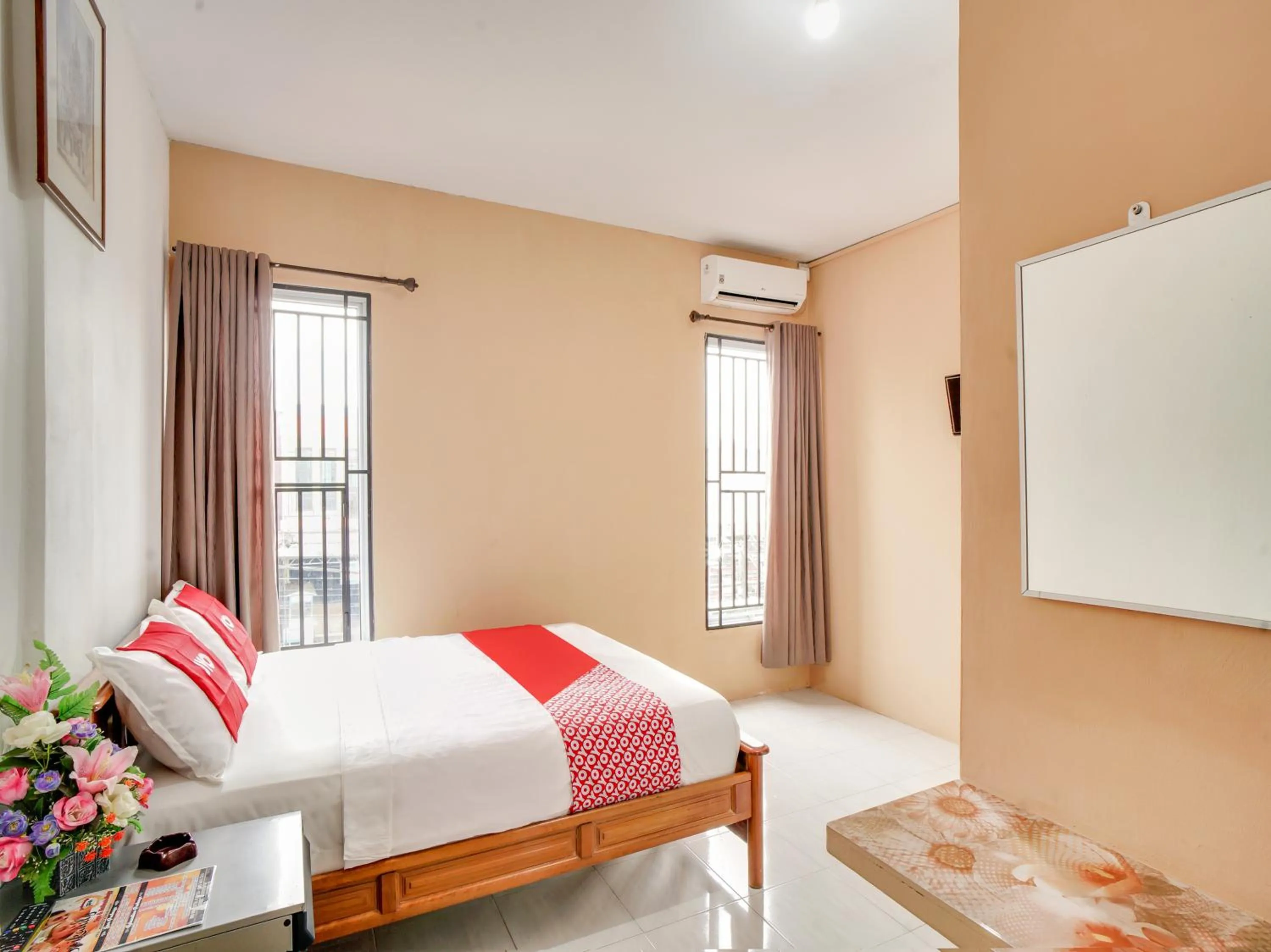 Bedroom, Bed in OYO 90024 Botania Homestay and Cafe