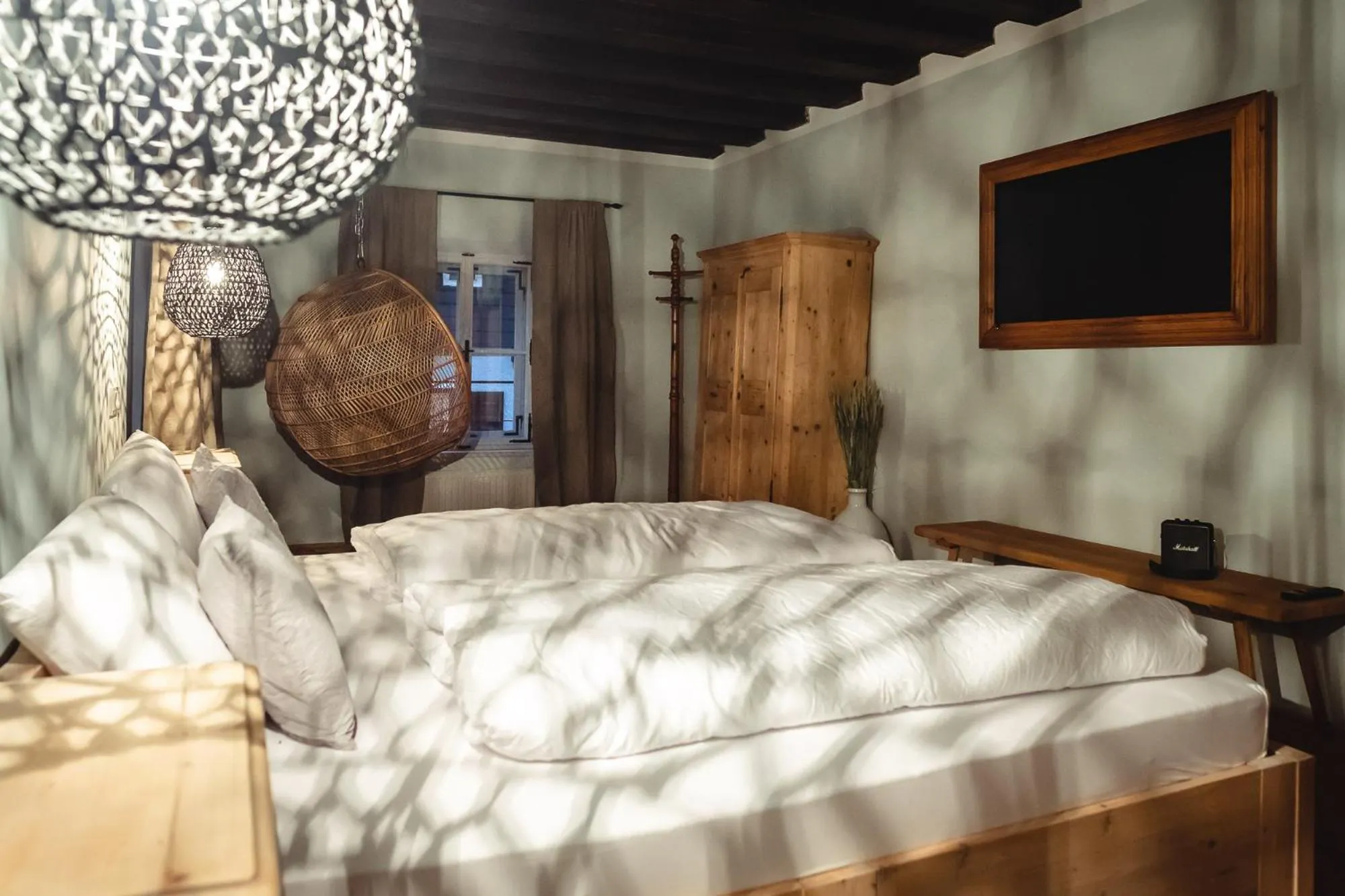 Bed in Der Steinerwirt - hangout & hotel