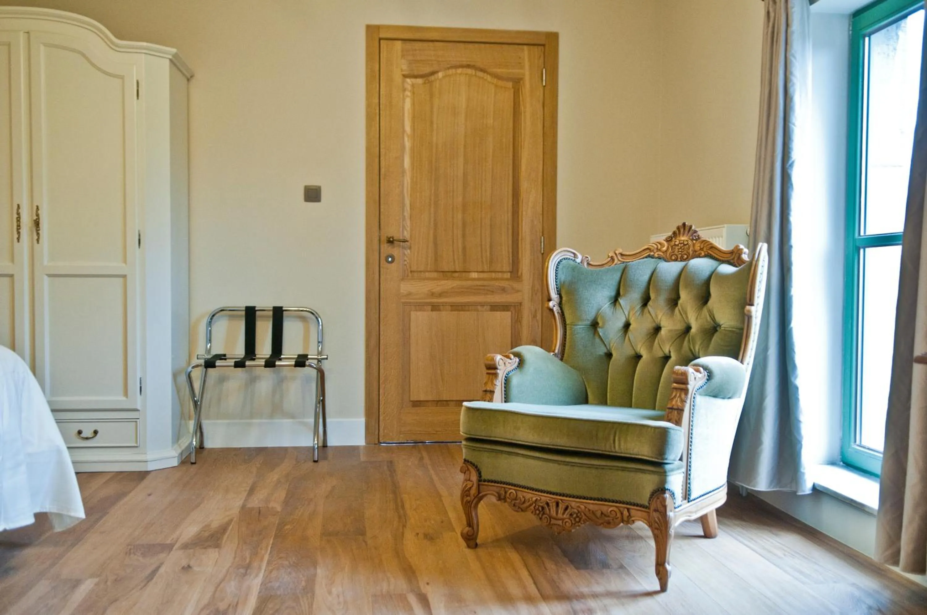 Seating area, Bed in B&B Haspenhoeve