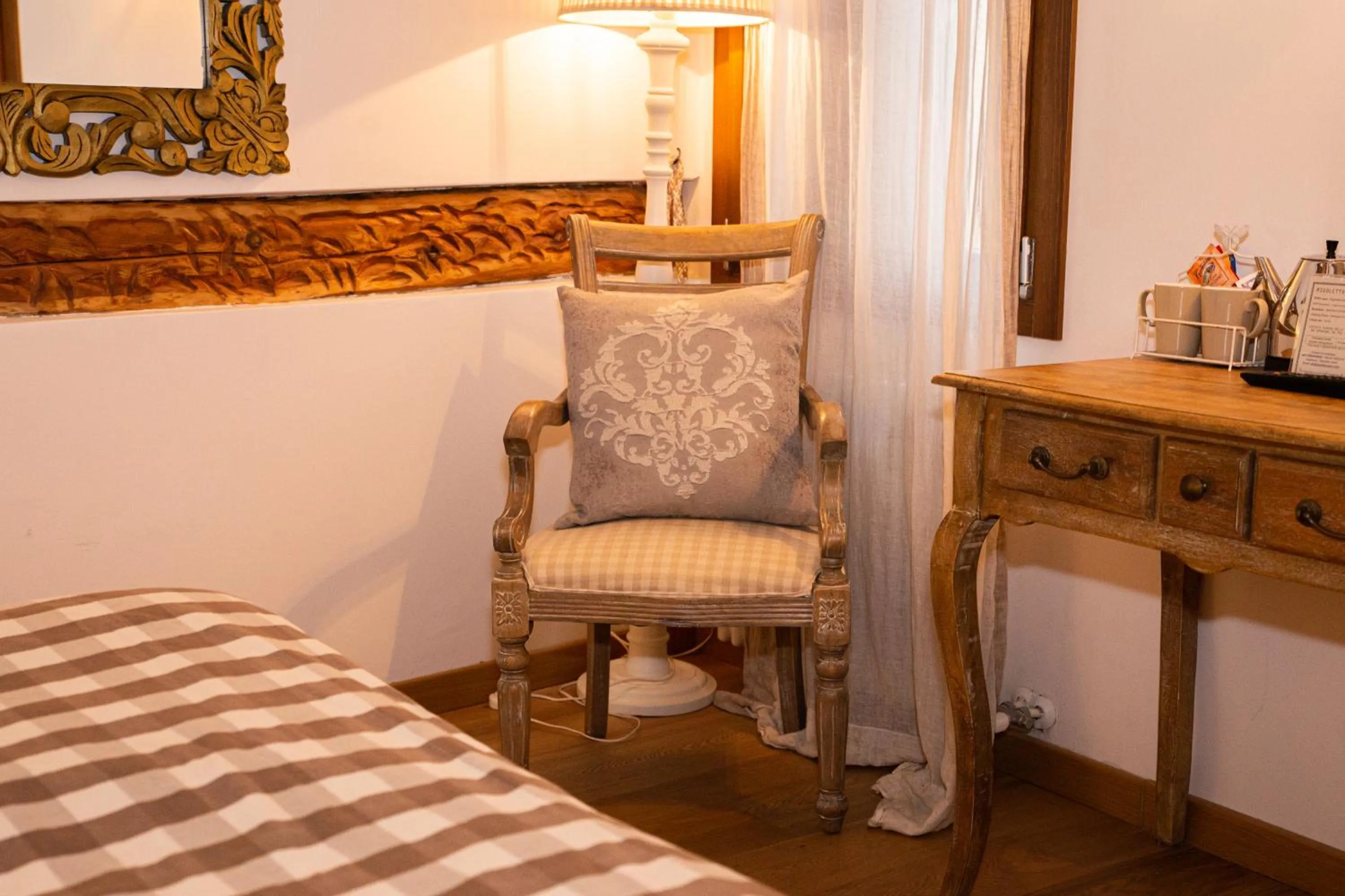 Living room, Bed in Rigoletto Charm