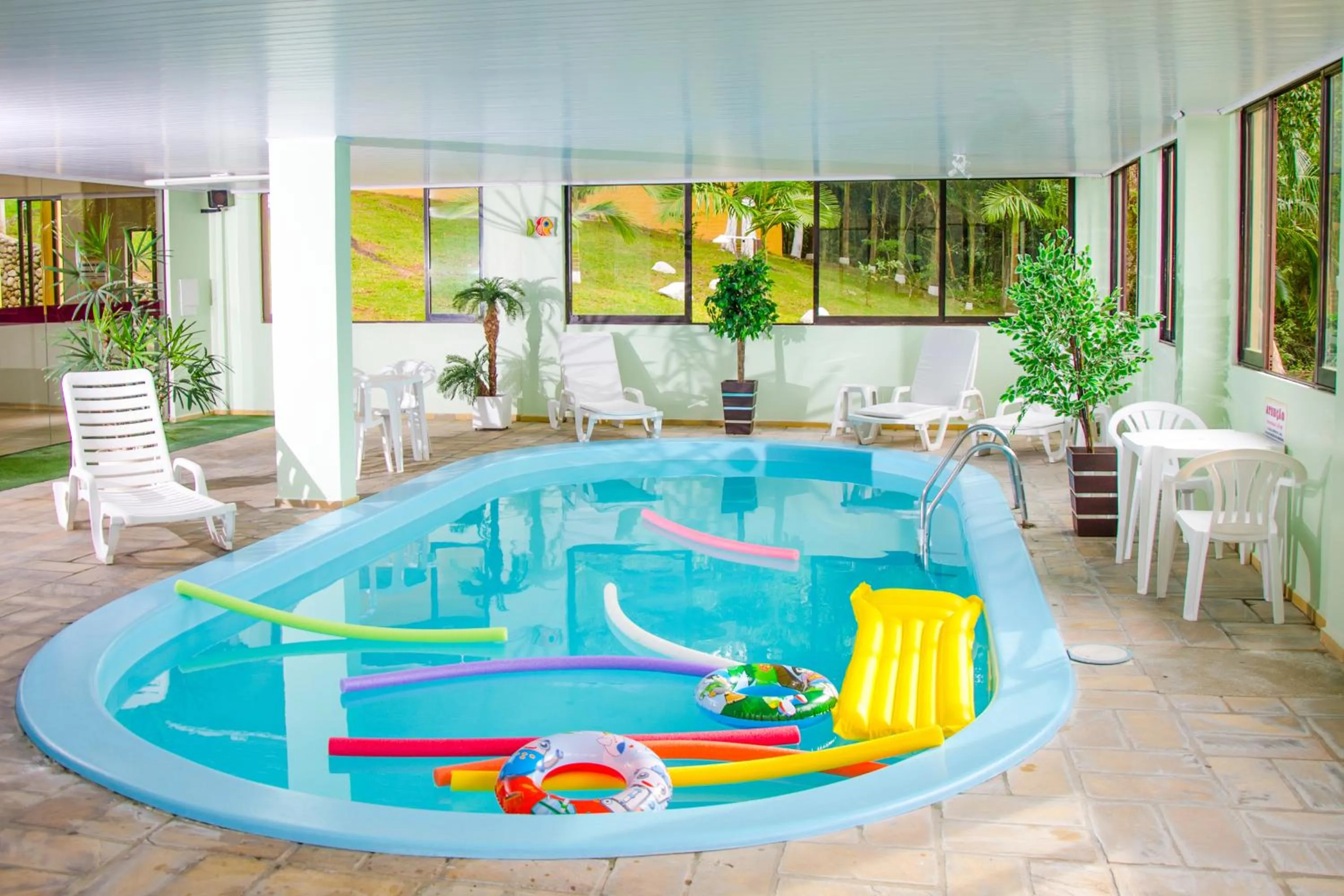 Swimming pool in Morro do Sol Hotel & Eventos