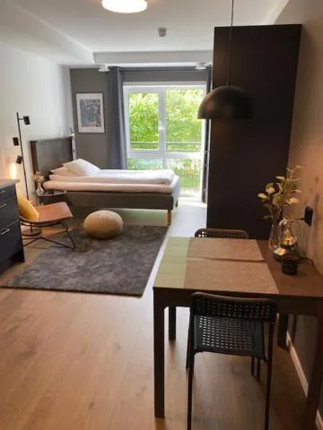 Dining area, Bed in Magnolia House Norrviken