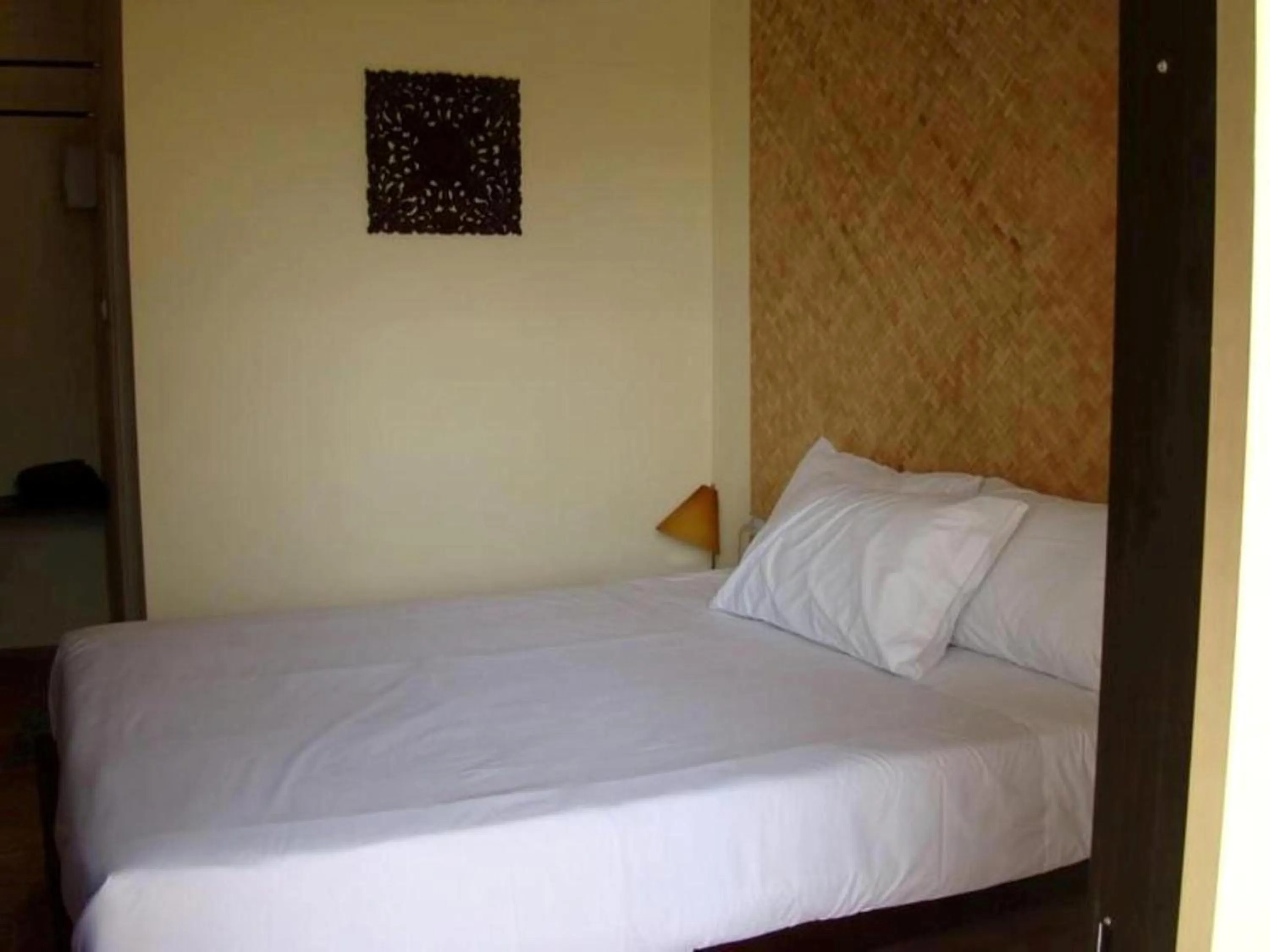 Bed in Bamboo Resort