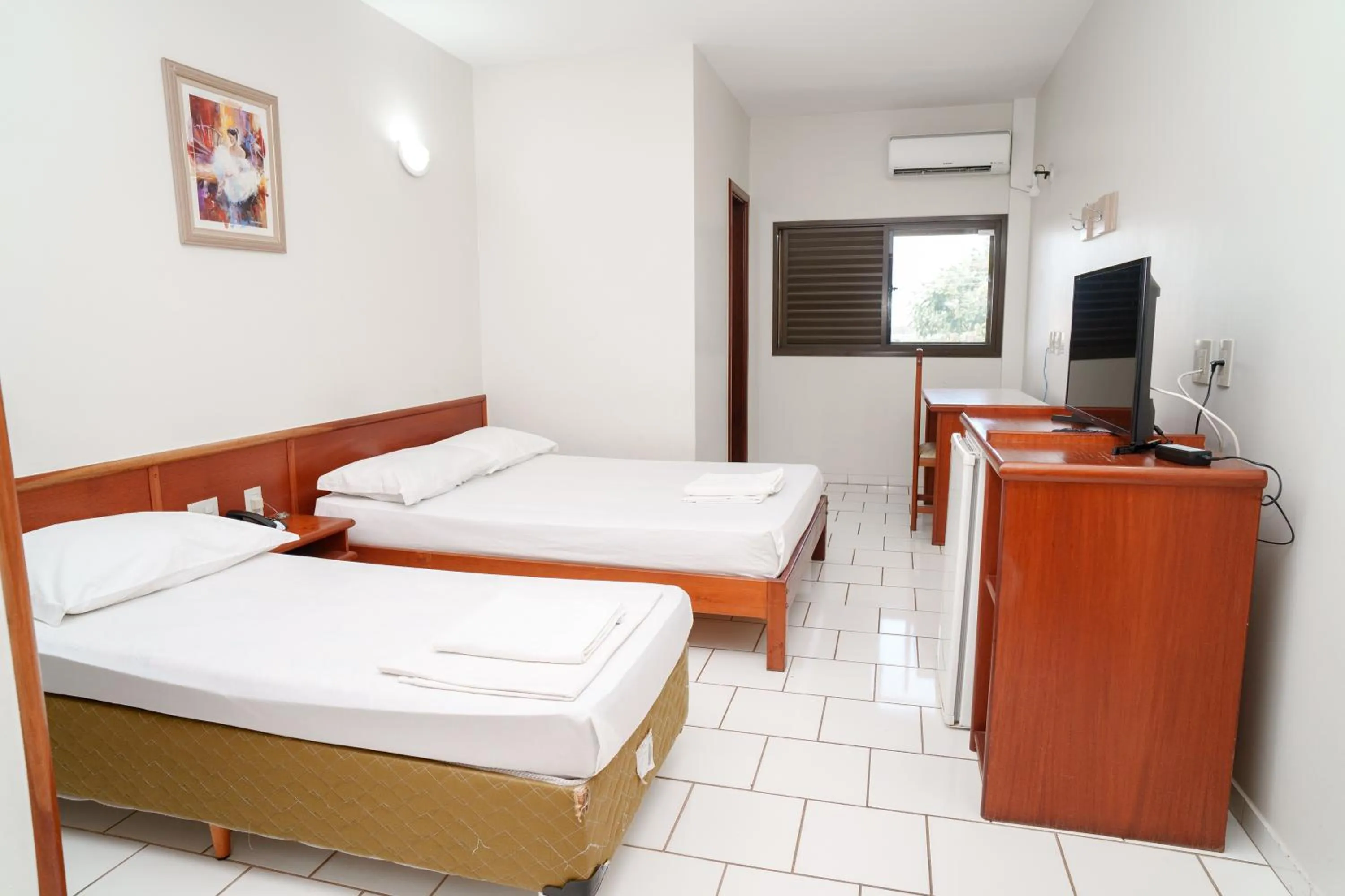 Bed in Sara Palace Hotel