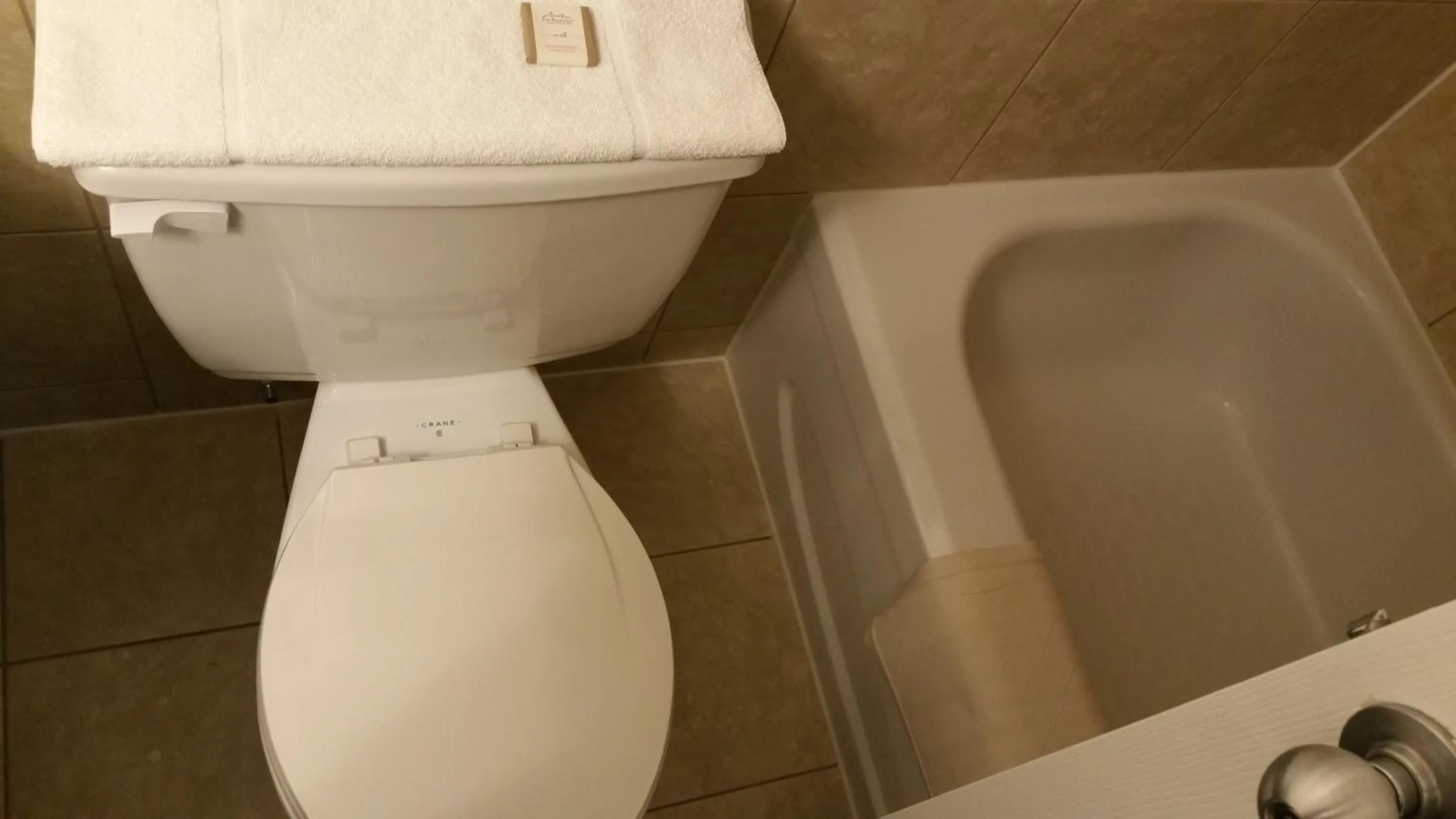 Bathroom in Howard Johnson by Wyndham Melville