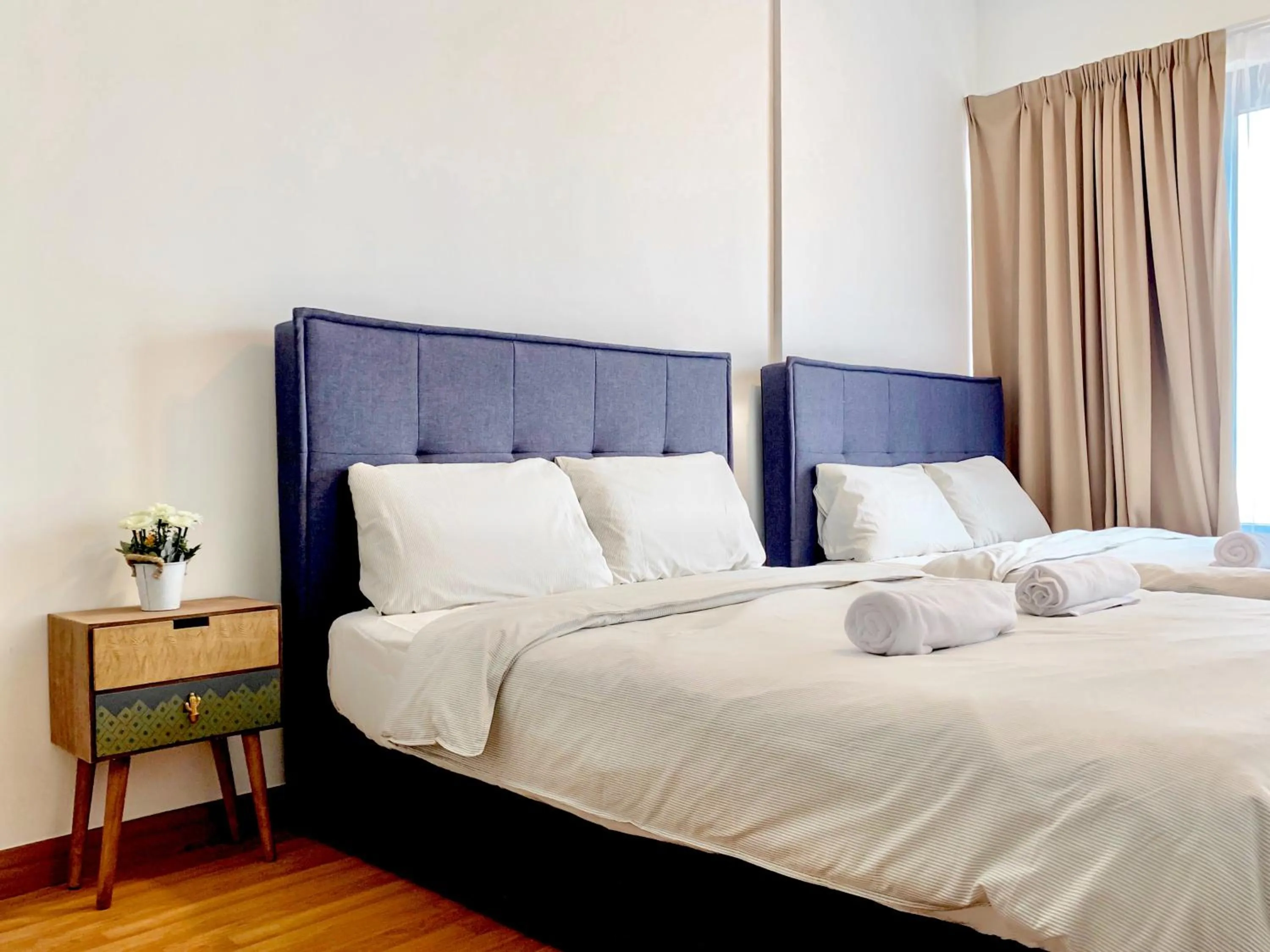 Bed in Georgetown Tropicana 218 Apartment