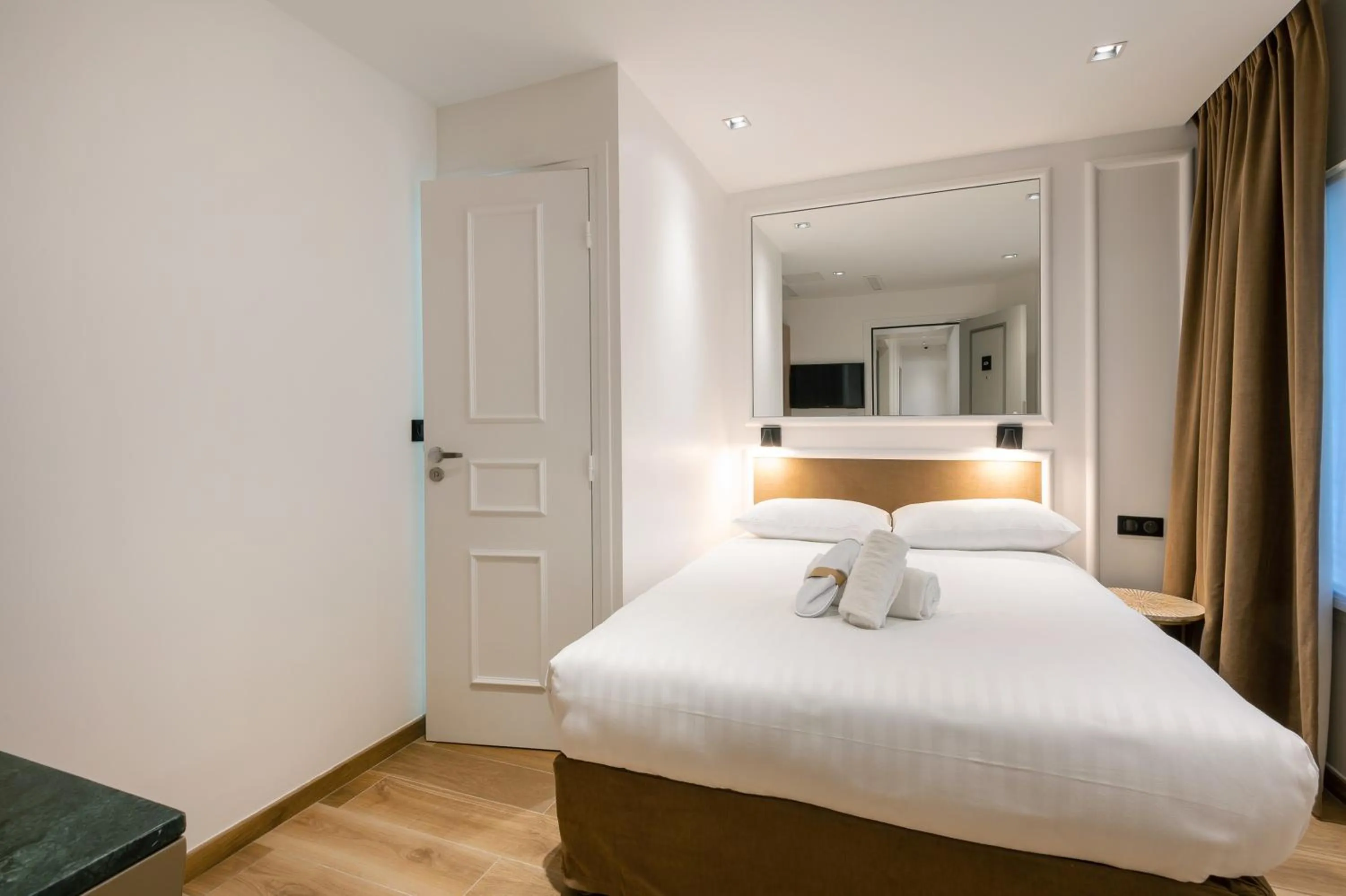 Photo of the whole room, Bed in HOTEL AU COEUR DE REPUBLIQUE