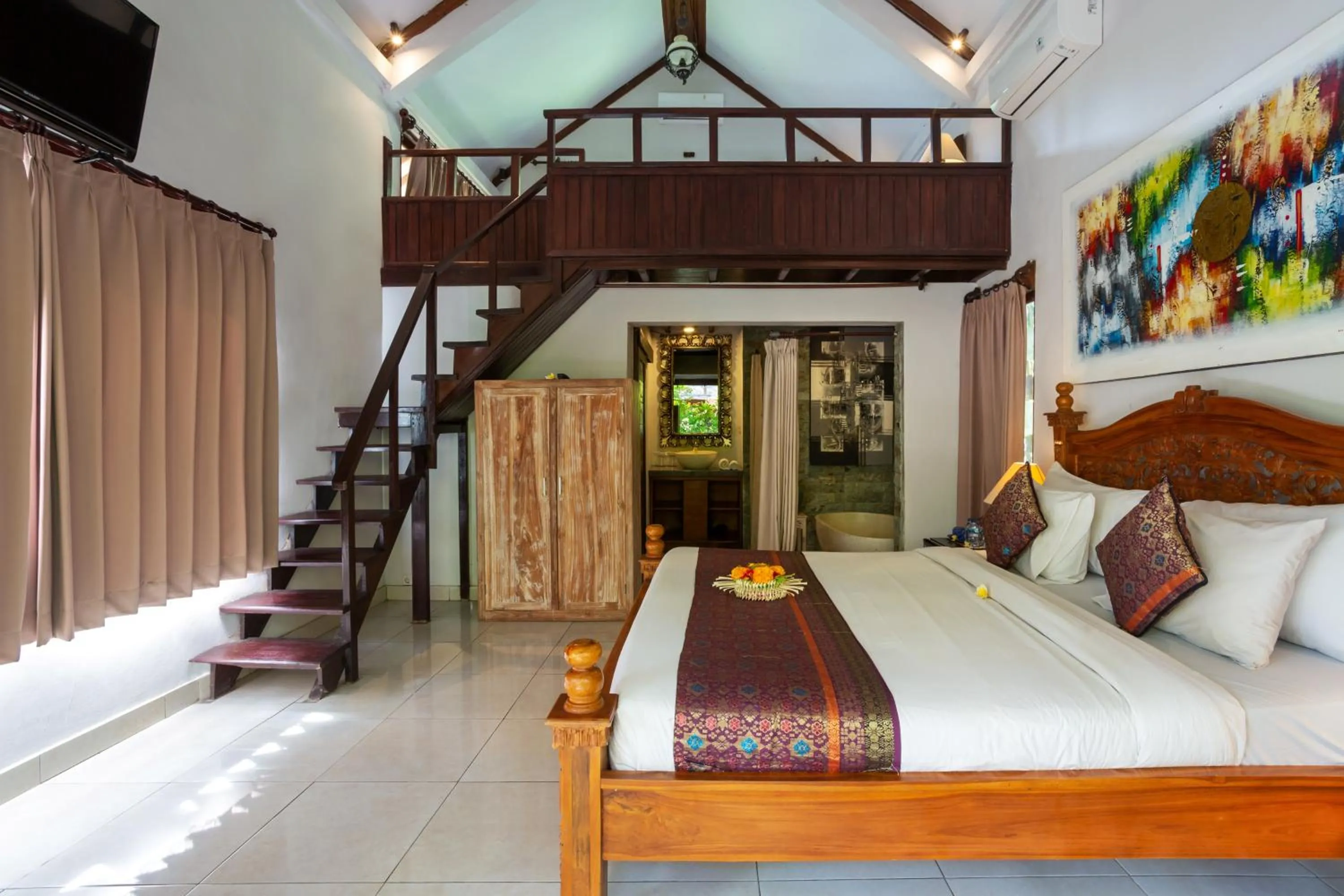 Photo of the whole room, Bed in Rahayu Suites Monkey Forest Ubud