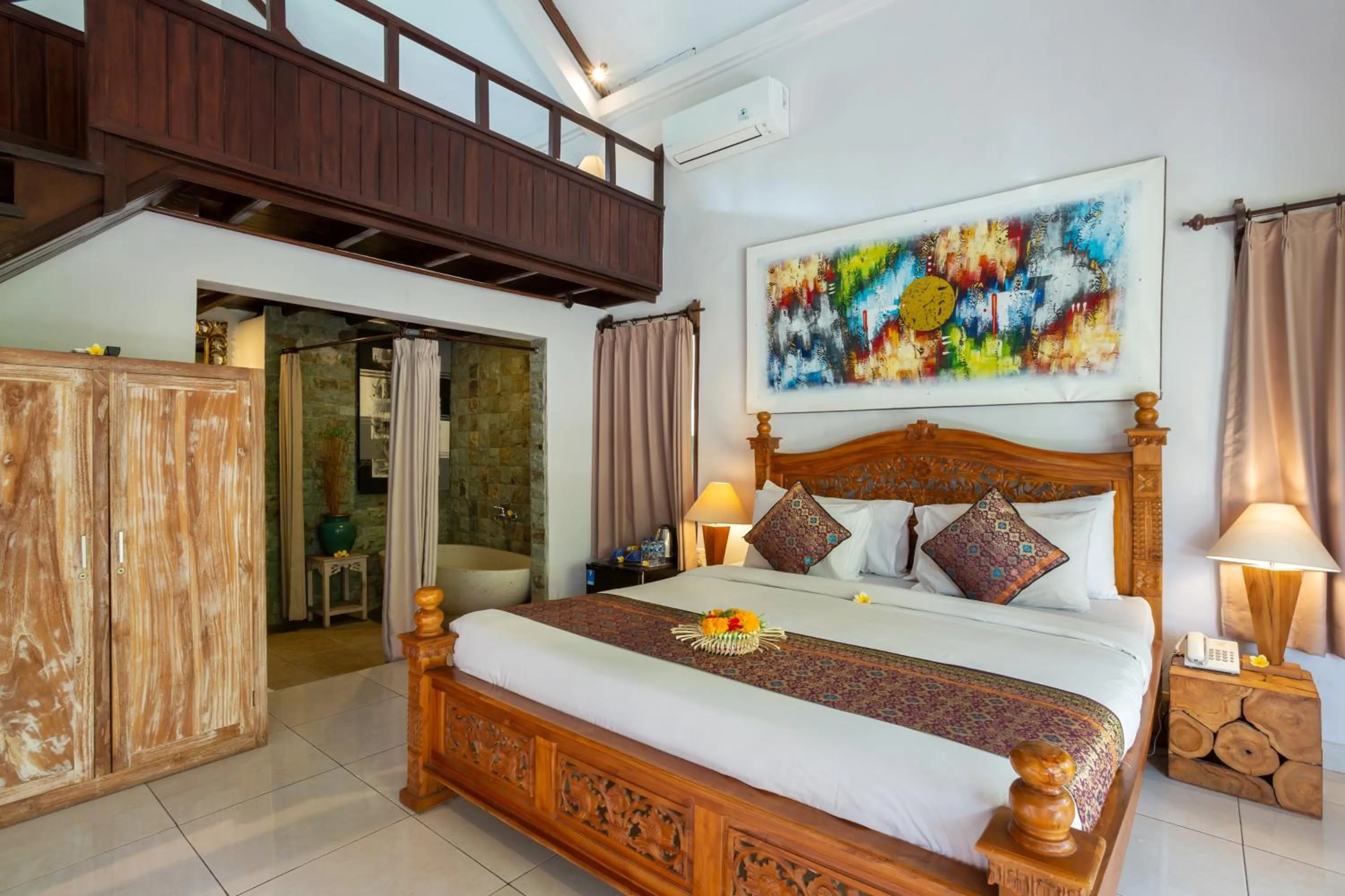 Photo of the whole room, Bed in Rahayu Suites Monkey Forest Ubud