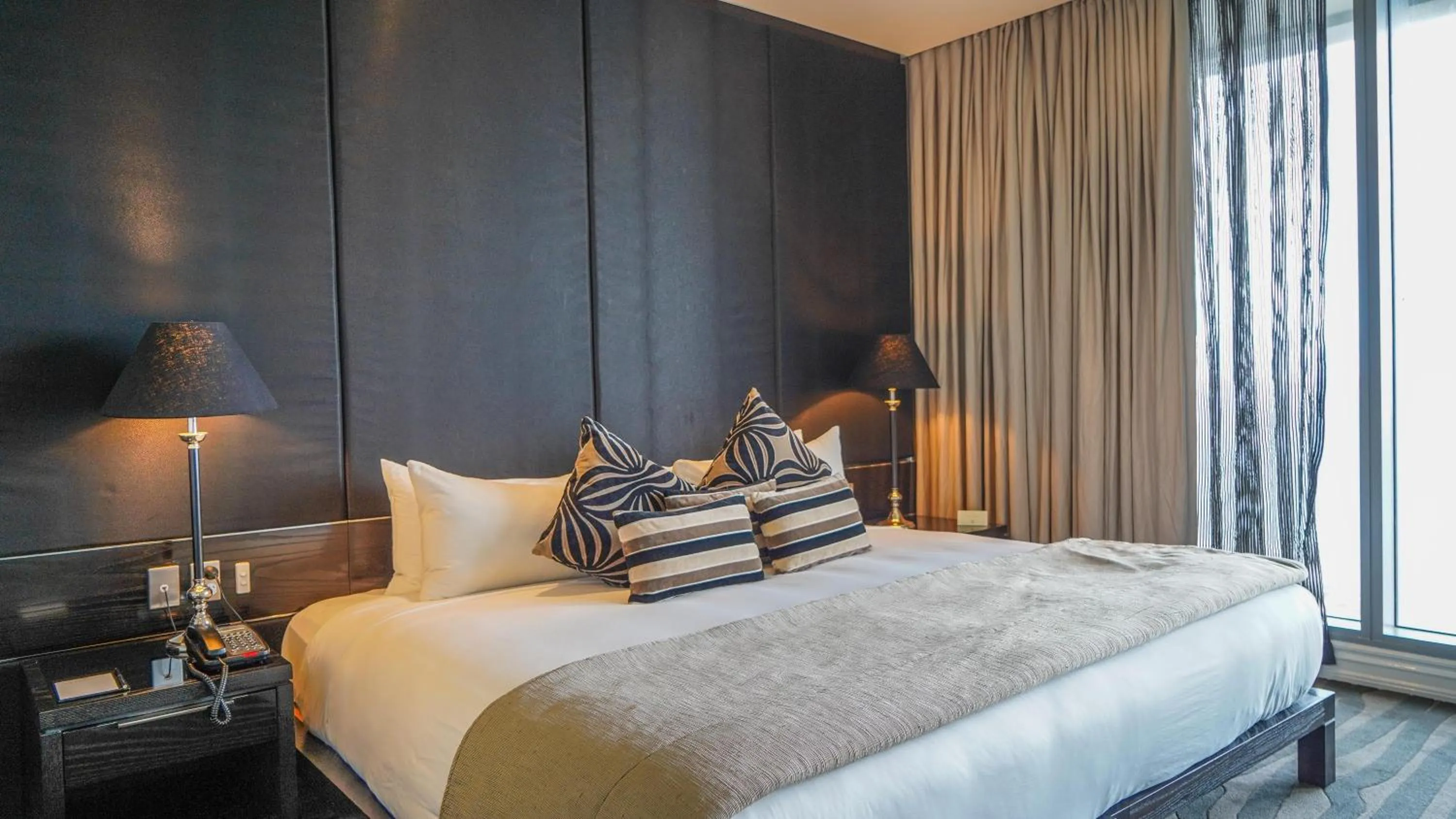 Bed in Grand Papua Hotel