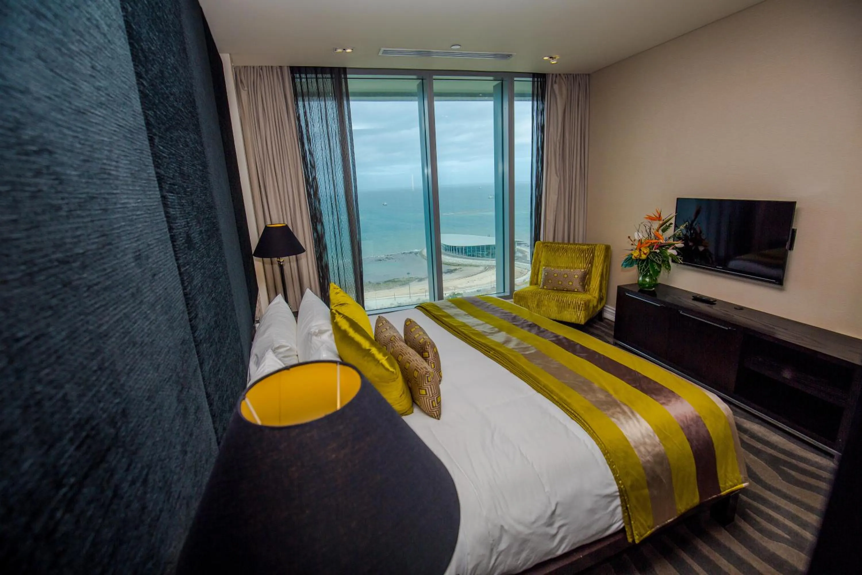 Bed in Grand Papua Hotel