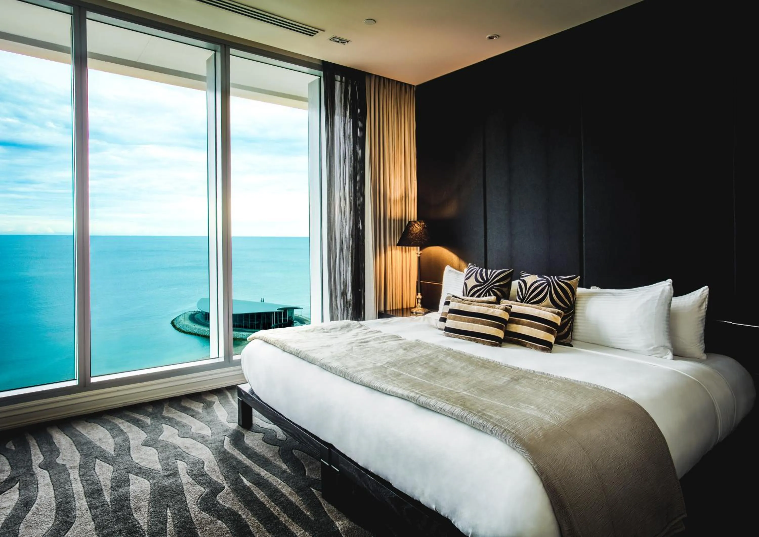 Bed in Grand Papua Hotel