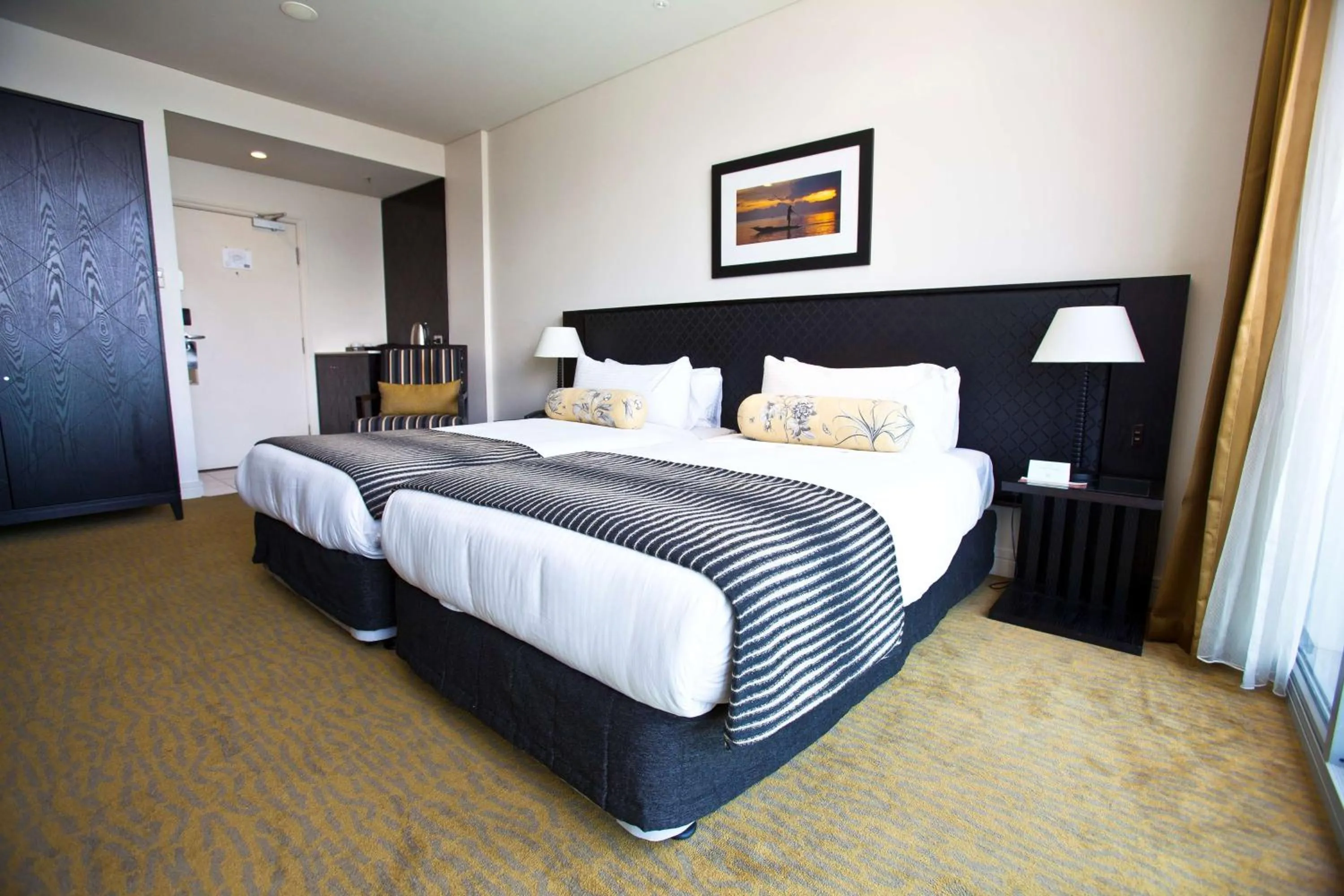 Bedroom in Grand Papua Hotel, a member of Radisson Individuals