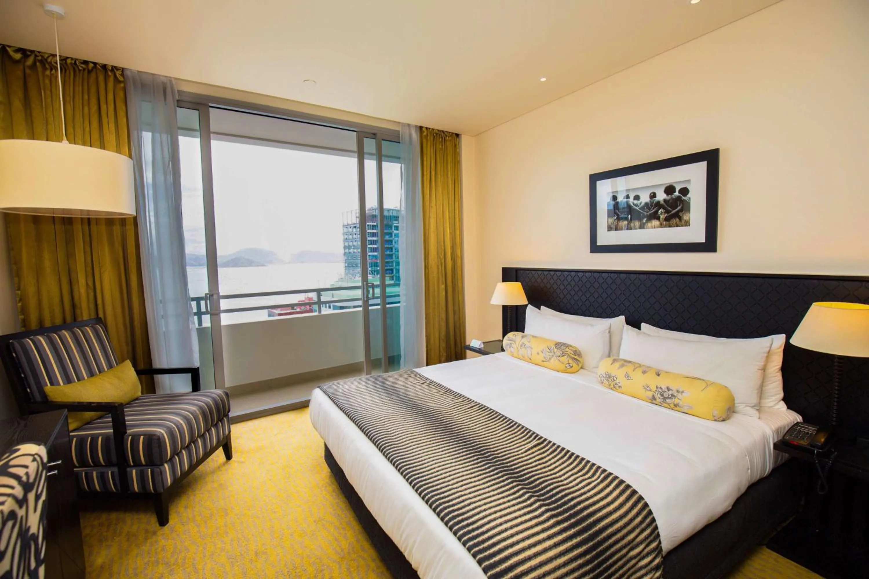 Bedroom in Grand Papua Hotel, a member of Radisson Individuals