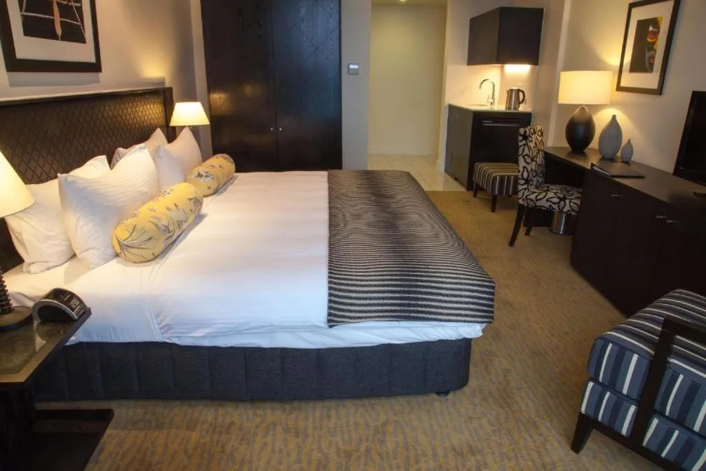 Bed in Grand Papua Hotel