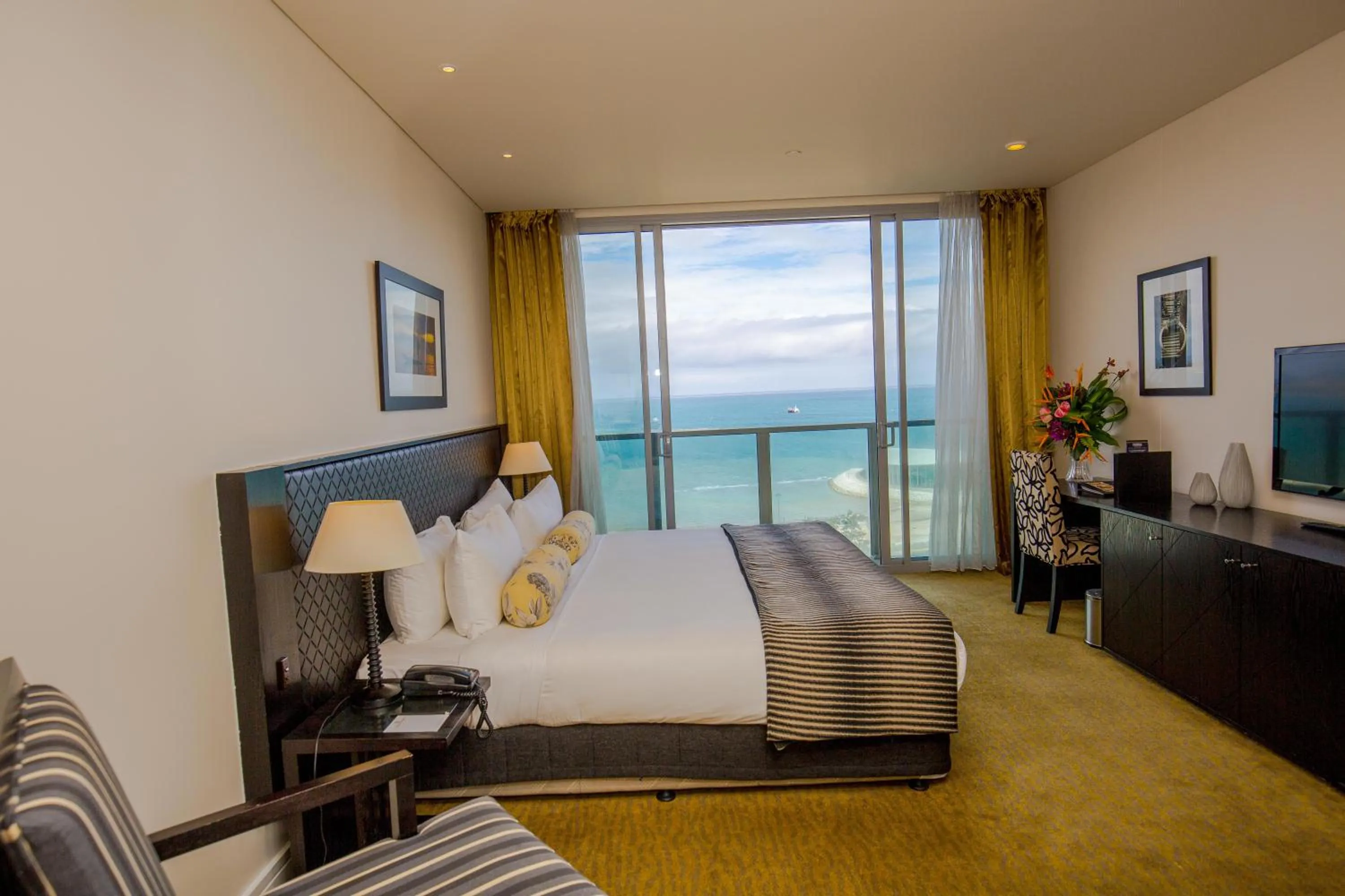 Bed in Grand Papua Hotel