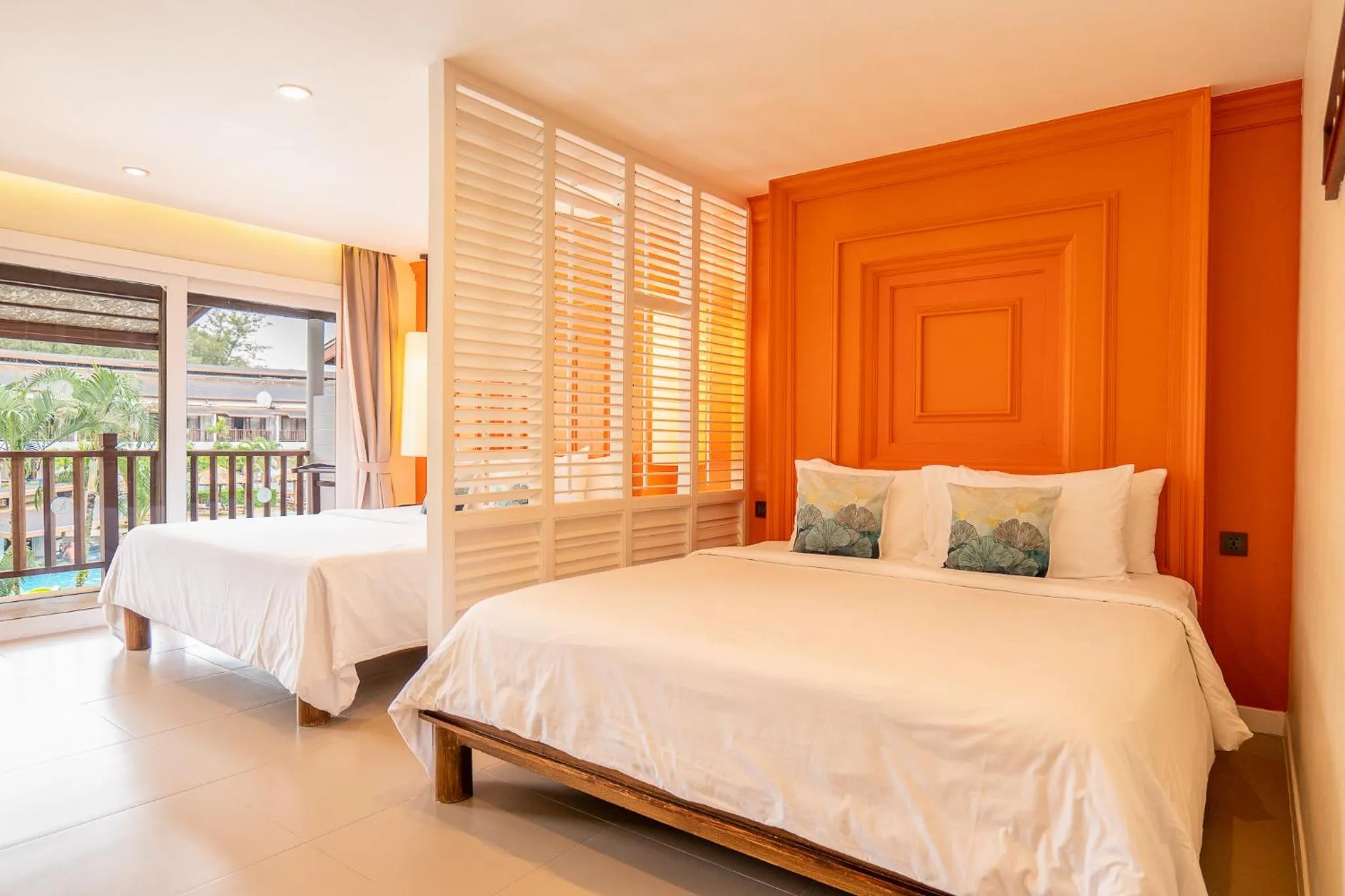 Bed in Arinara Beach Resort Phuket - SHA Extra Plus