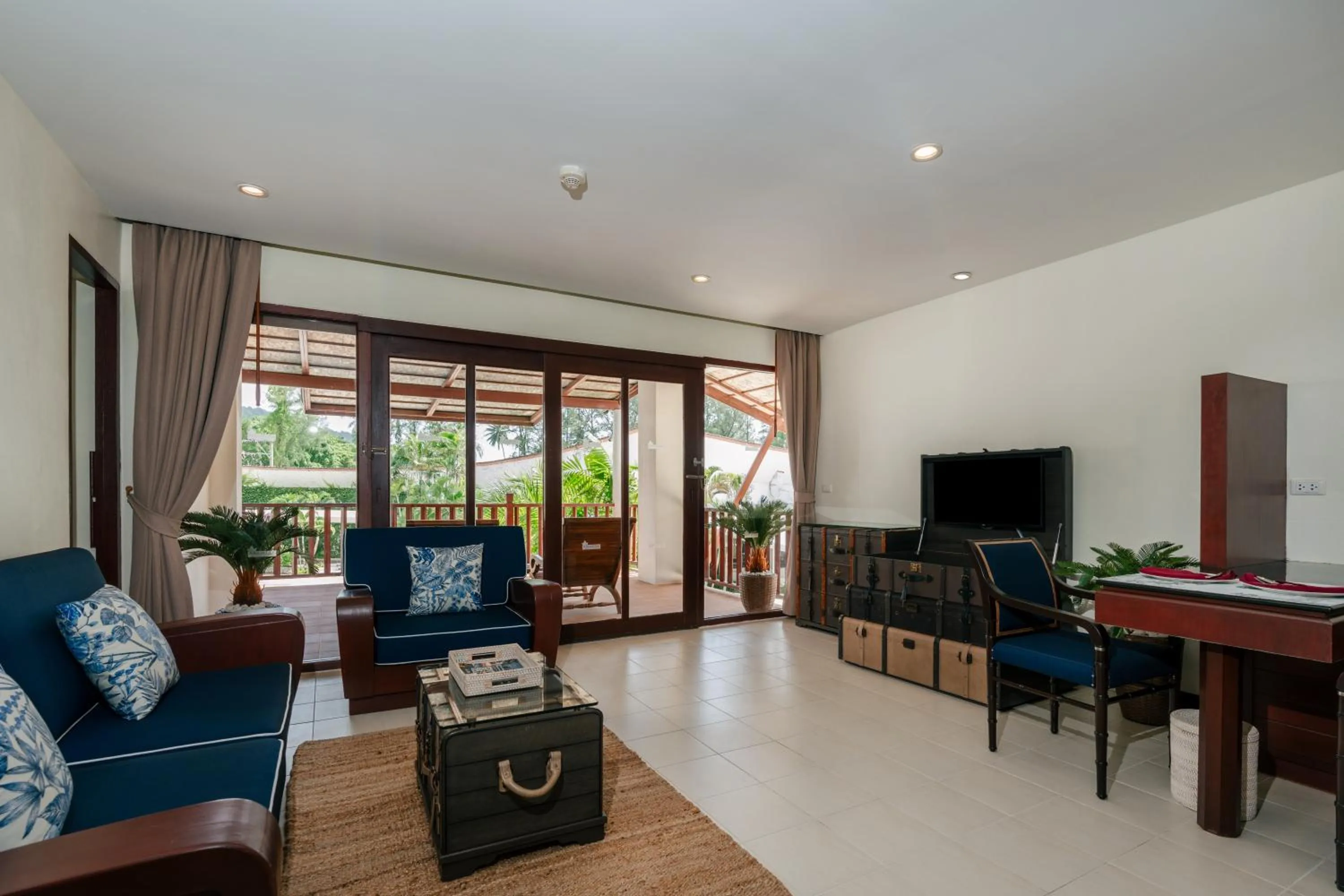 Living room in Arinara Beach Resort Phuket - SHA Extra Plus