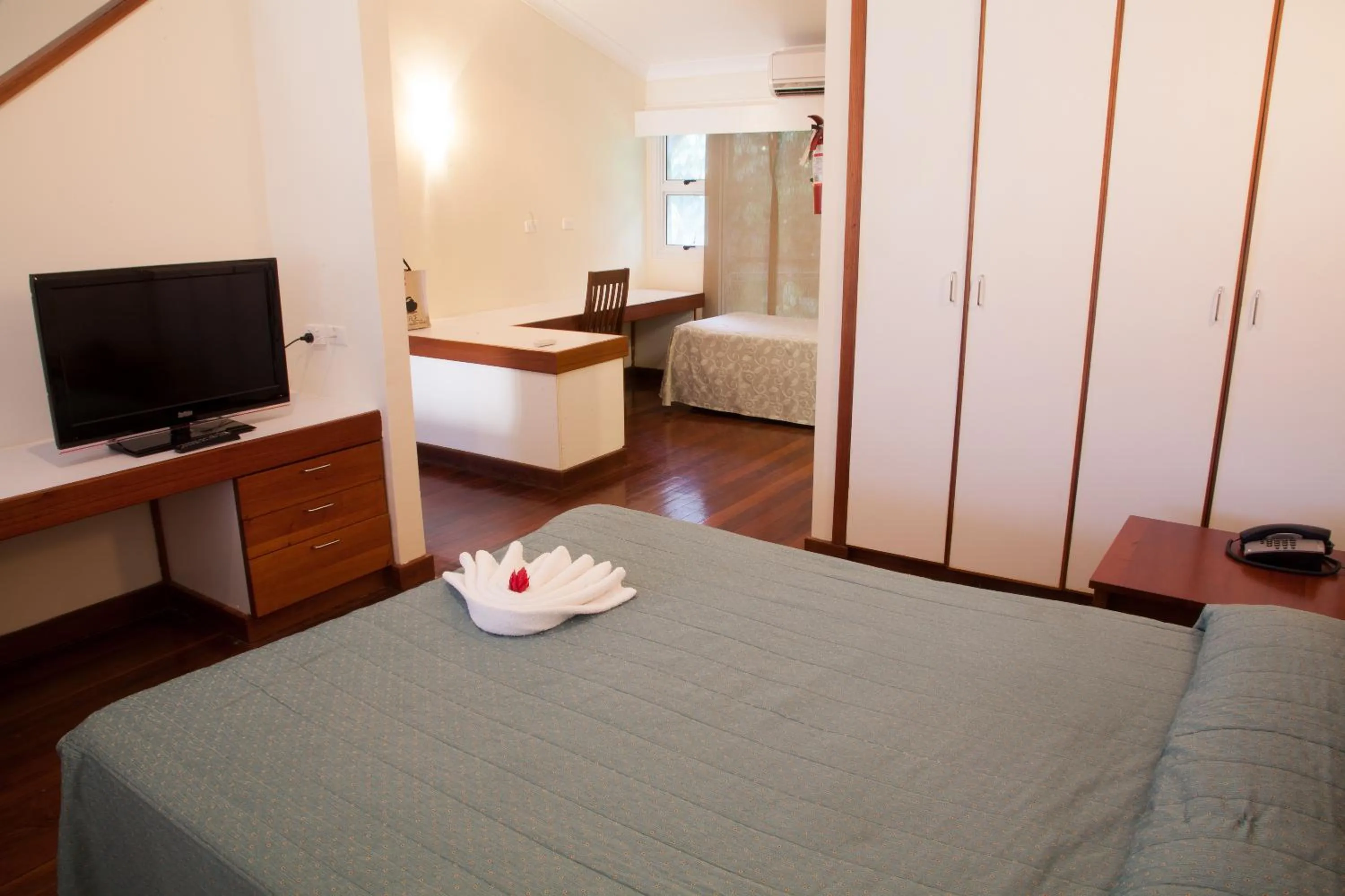 Bed in Huon Gulf Hotel