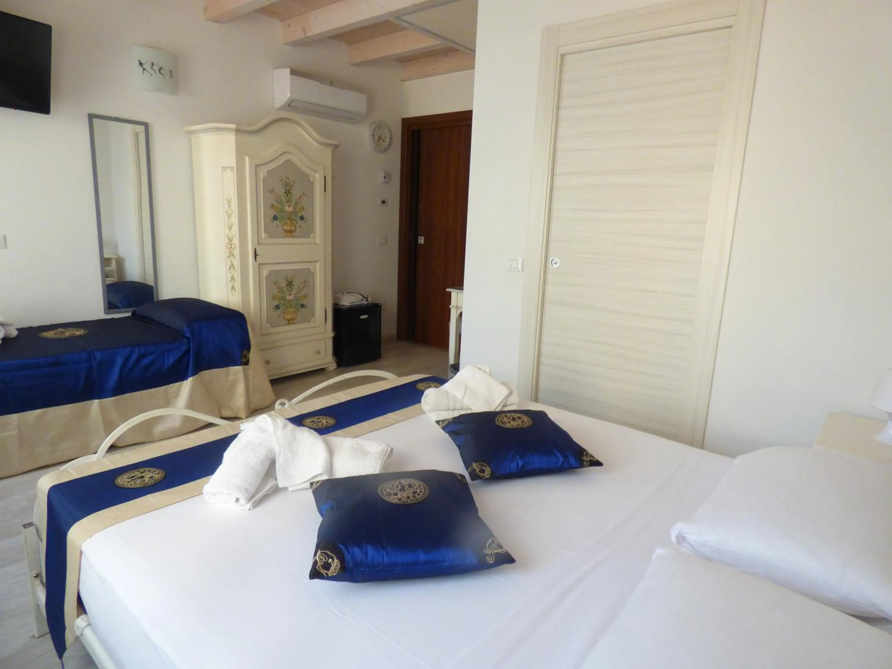 Bed in NICOLE DONEY LOCAZIONE TURISTICA