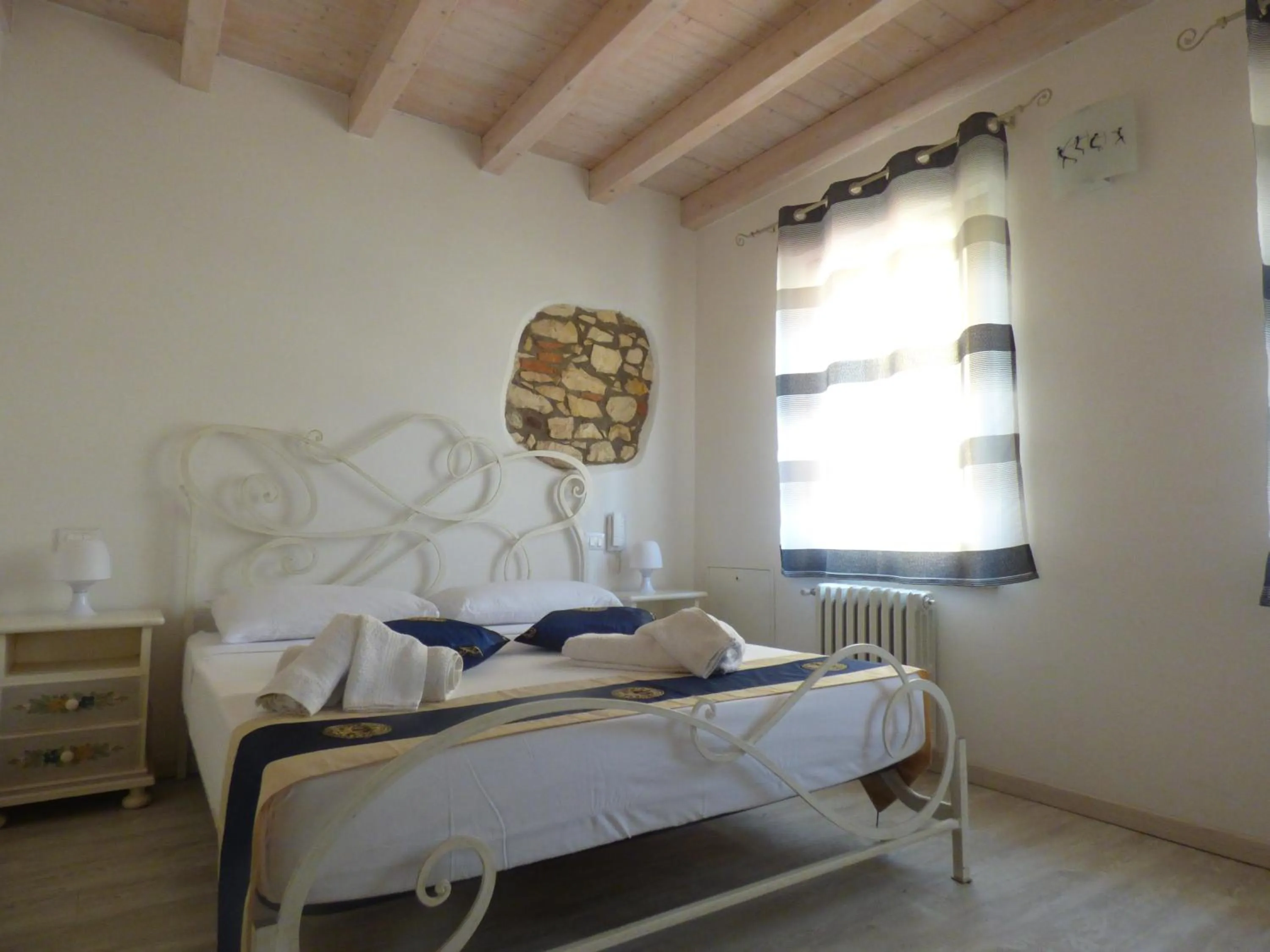 Bed in NICOLE DONEY LOCAZIONE TURISTICA