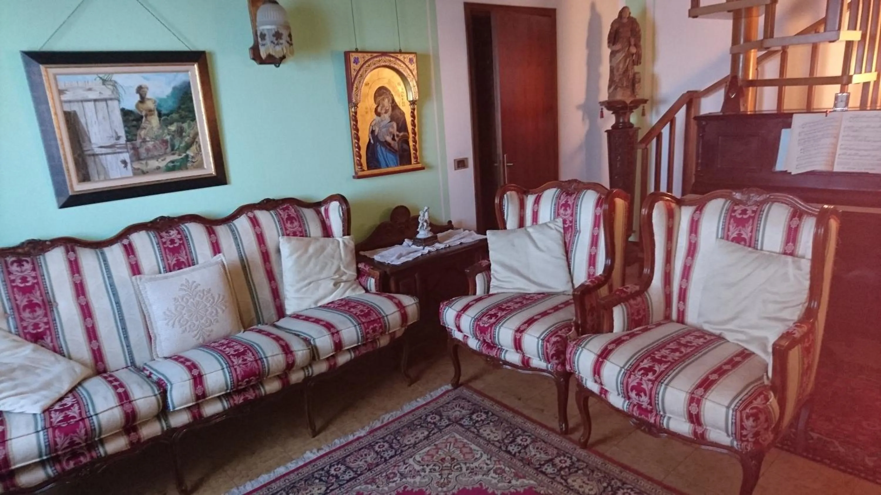 Communal lounge/ TV room in B&B da Paolo con vista Lago di Garda