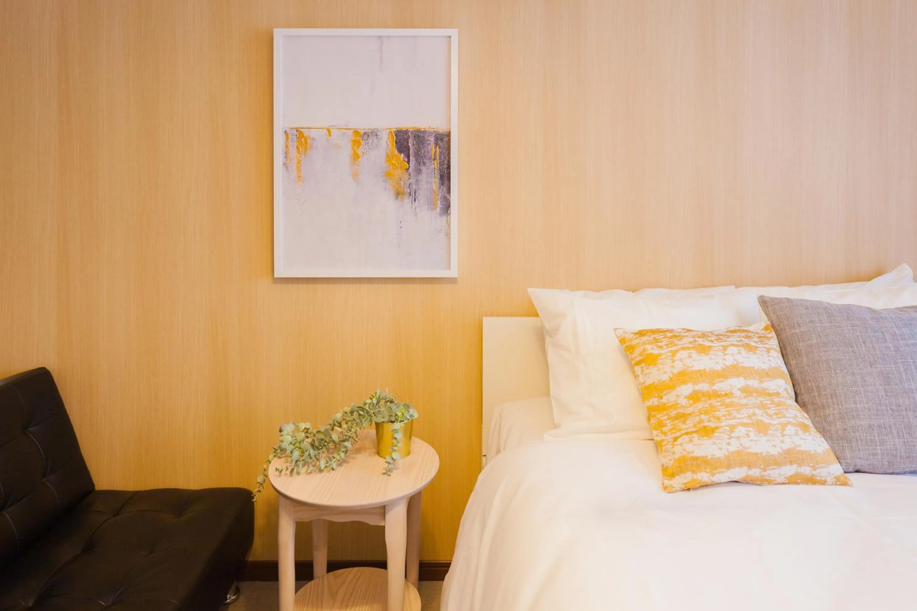 Bed in Prestige Suites Osaka Kishinosato-Tamade