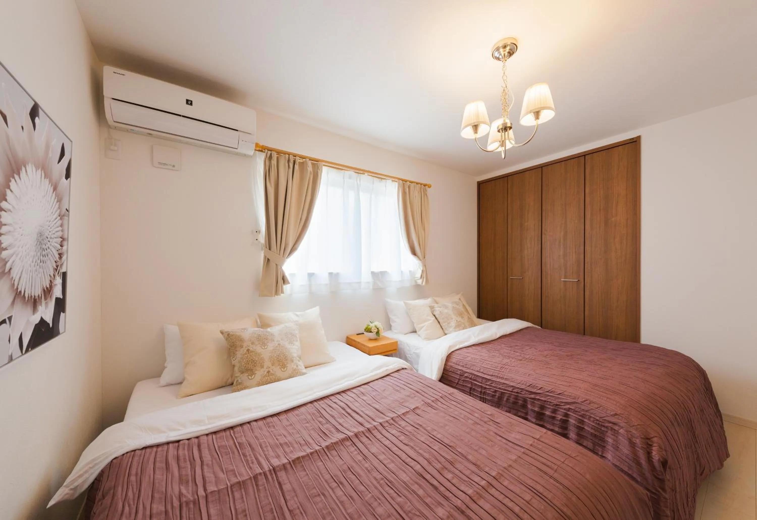 Bed in Prestige Suites Osaka Kishinosato-Tamade