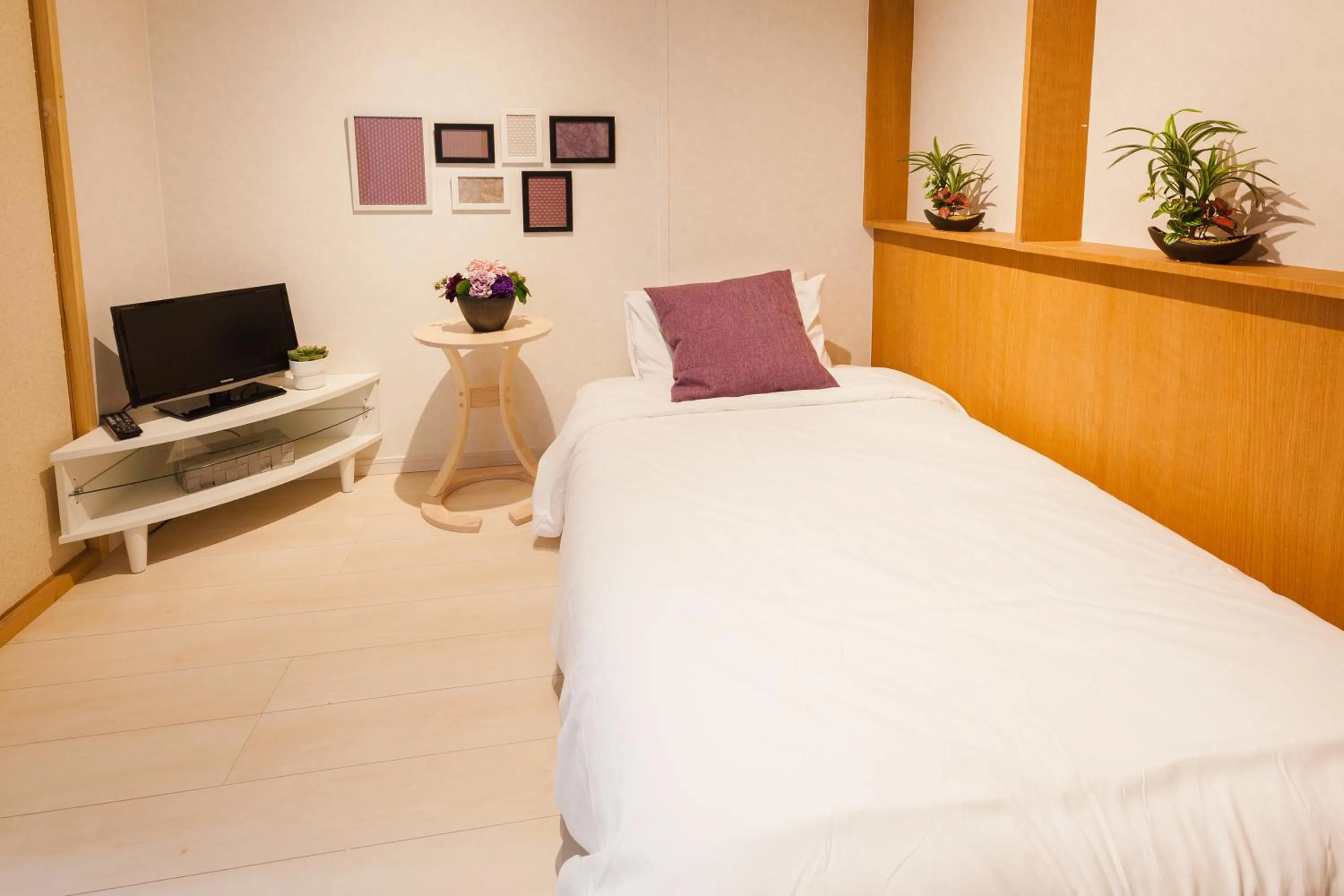 Bed in Prestige Suites Osaka Kishinosato-Tamade