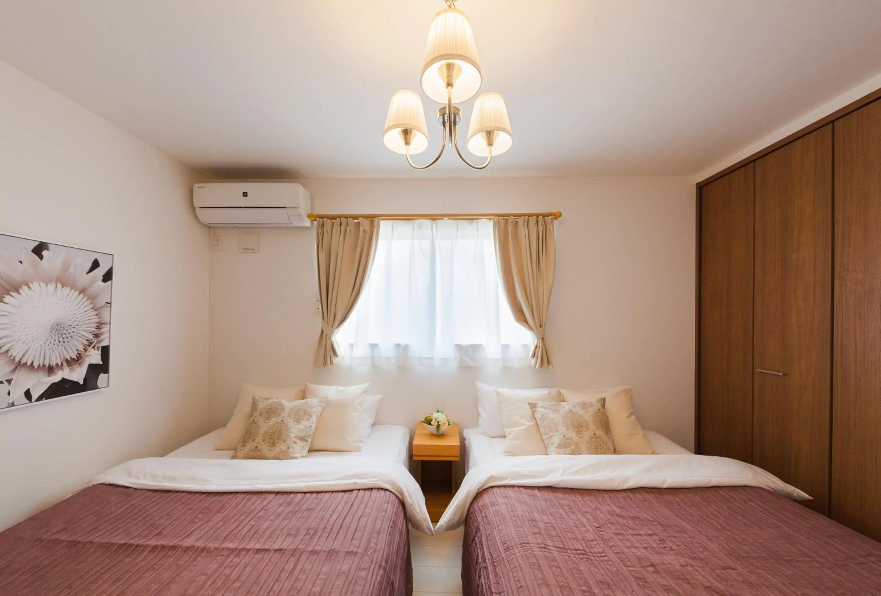 Bed in Prestige Suites Osaka Kishinosato-Tamade