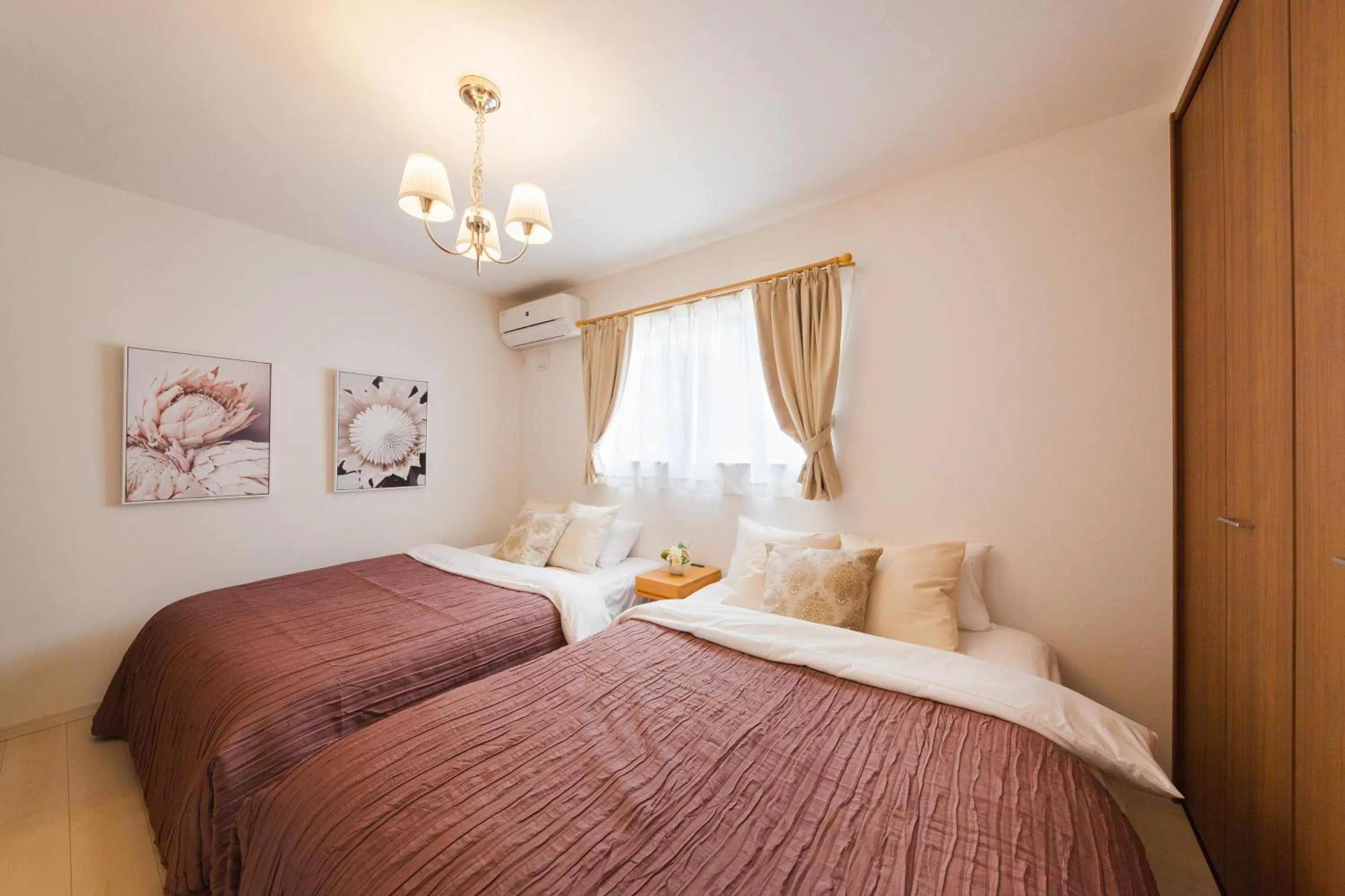 Bed in Prestige Suites Osaka Kishinosato-Tamade