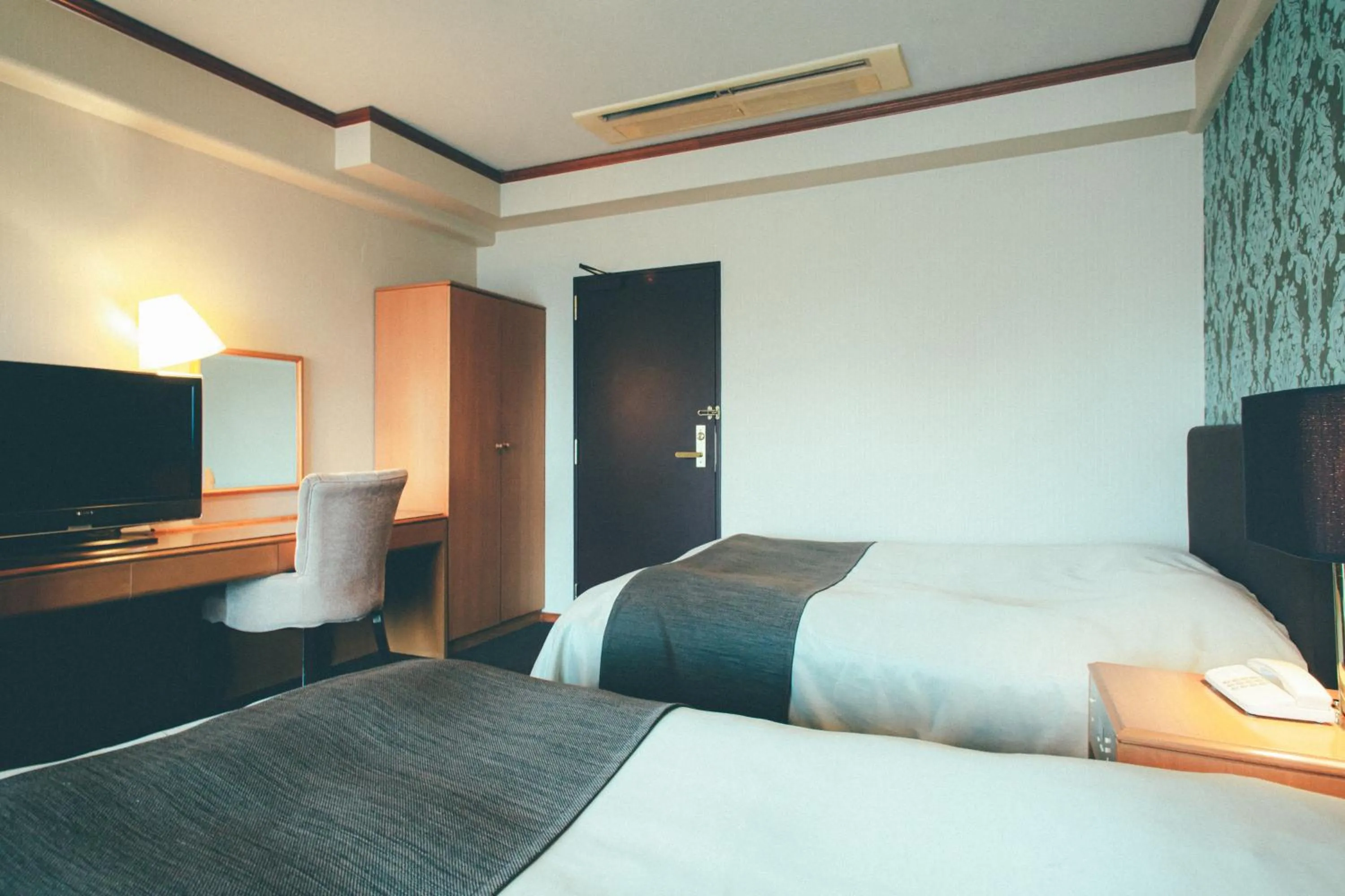 Bed in Hotel Villa Kuretake